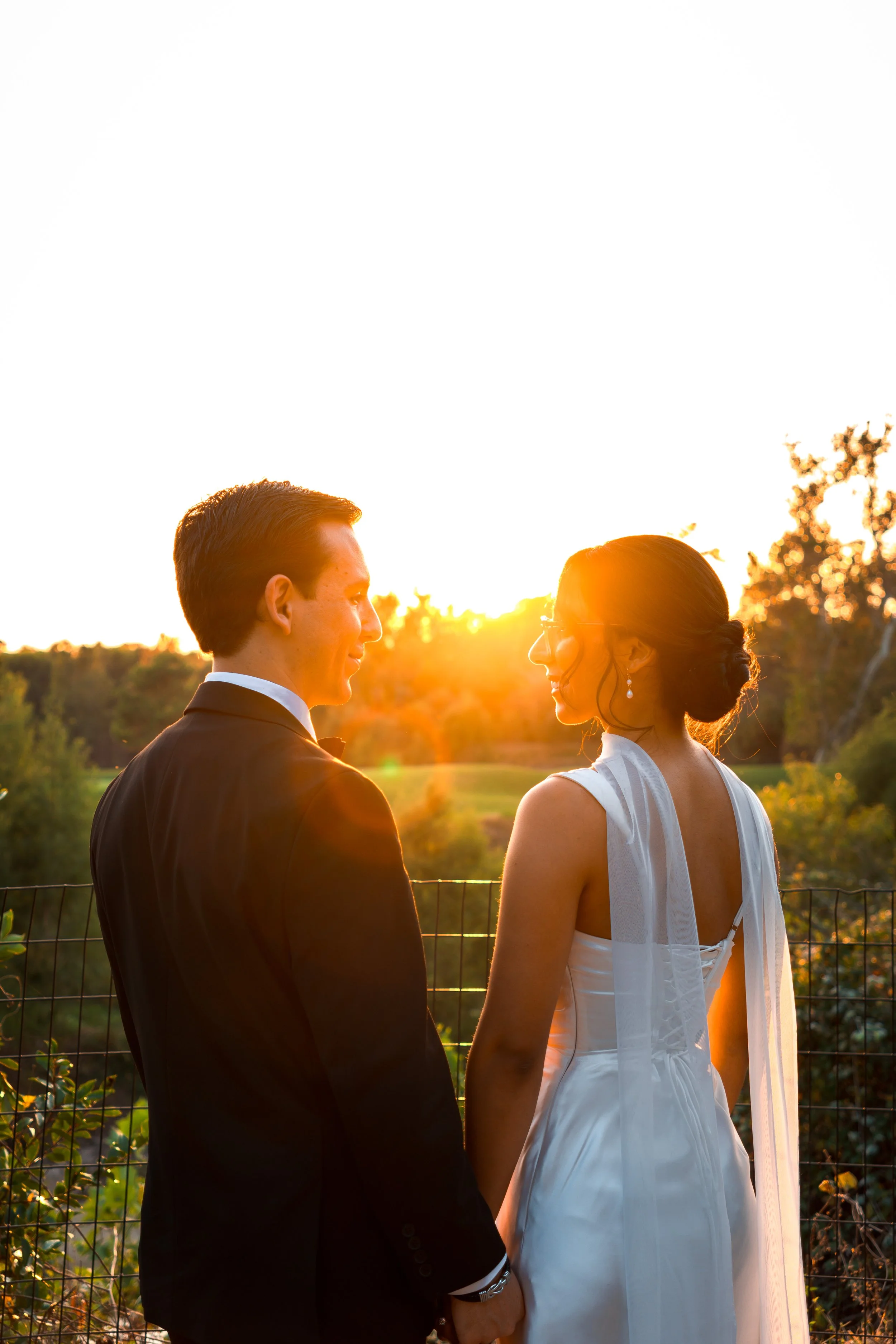A newly engaged couple seeing a sunset in Houston captured by an engagement photographer.