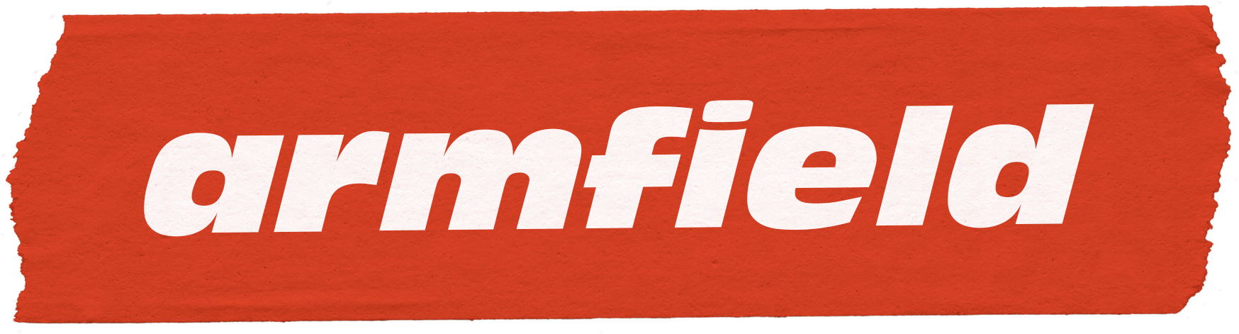 The image shows a torn piece of paper with a red background, featuring the word 'Armfield' written in bold, white lowercase letters.
