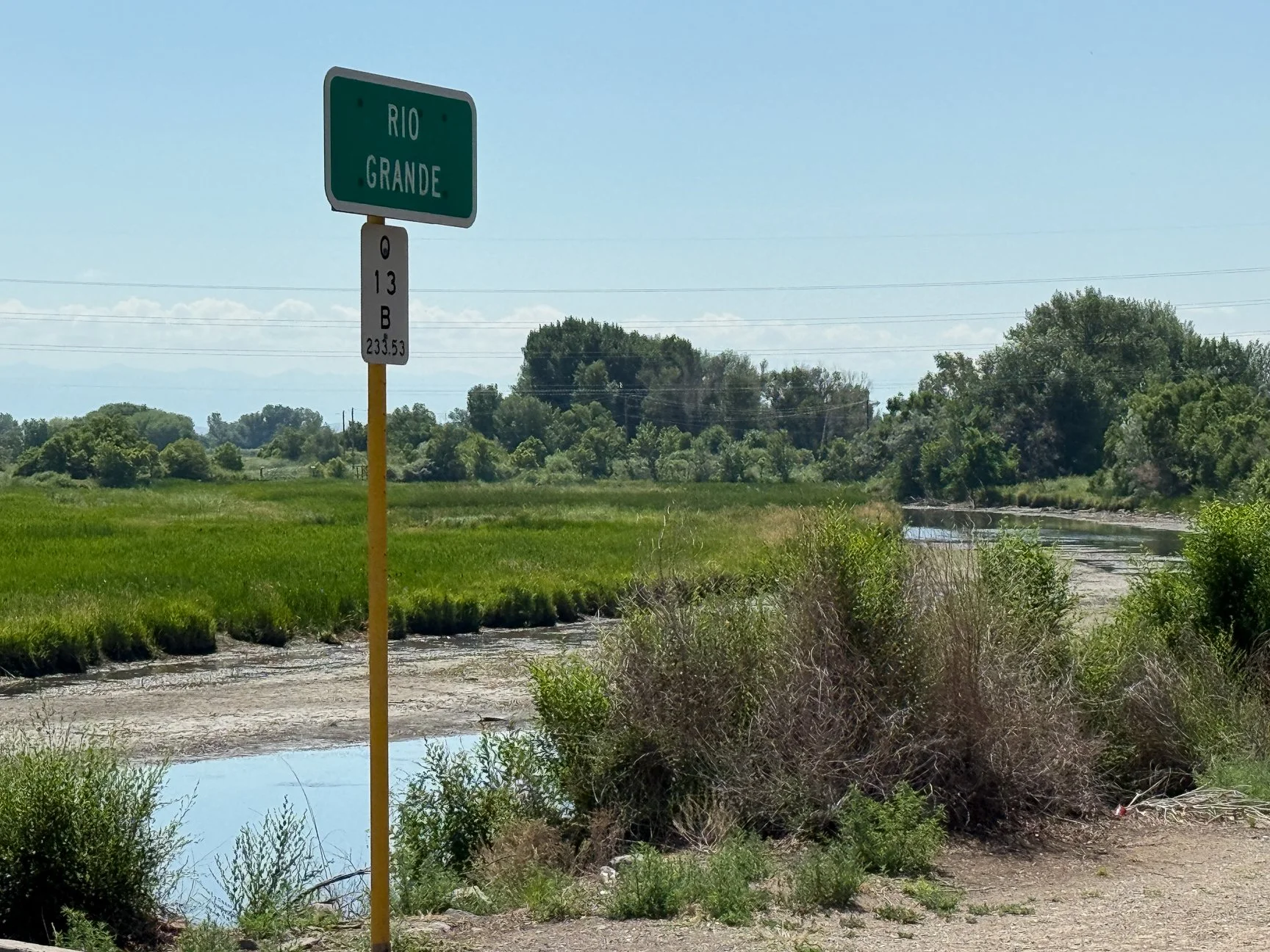In Alamosa, the mighty Rio Grande ... as a wide stream.