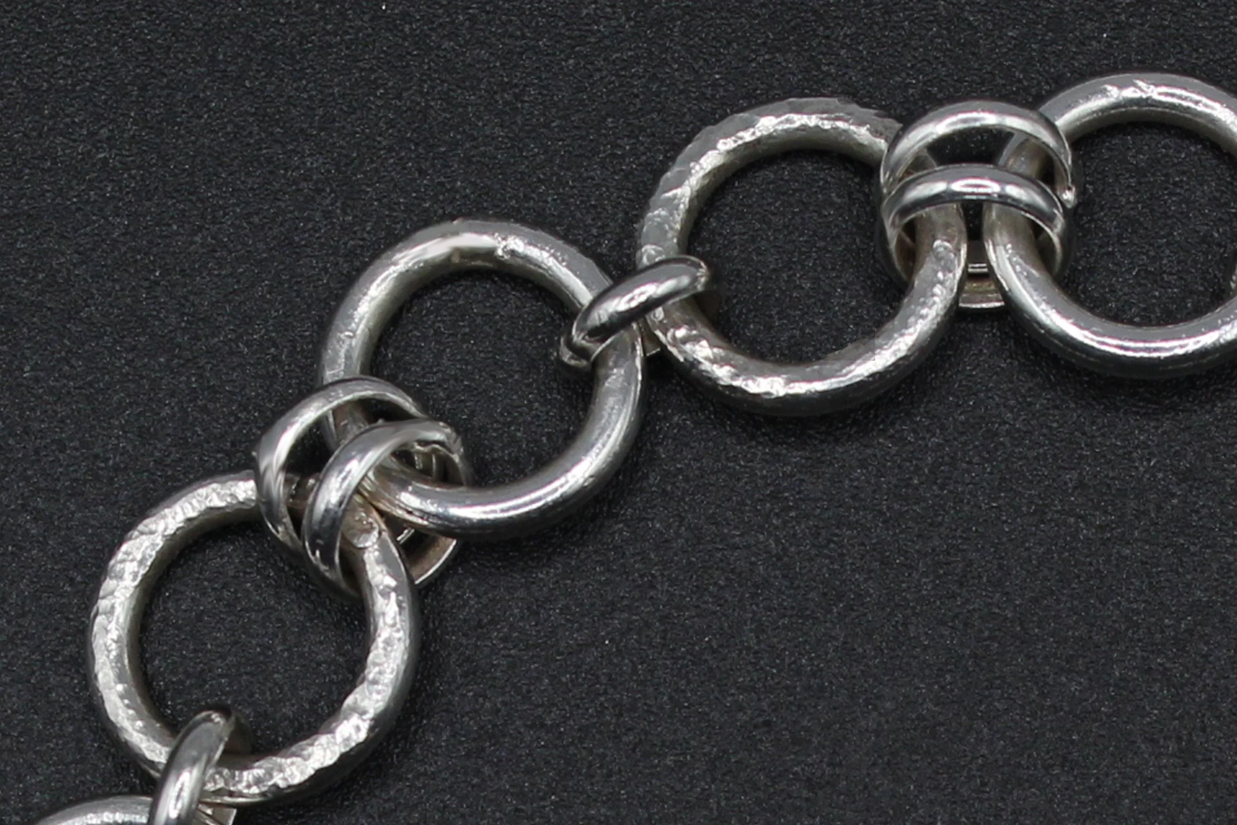 detail: bracelet, textured & polished sterling silver