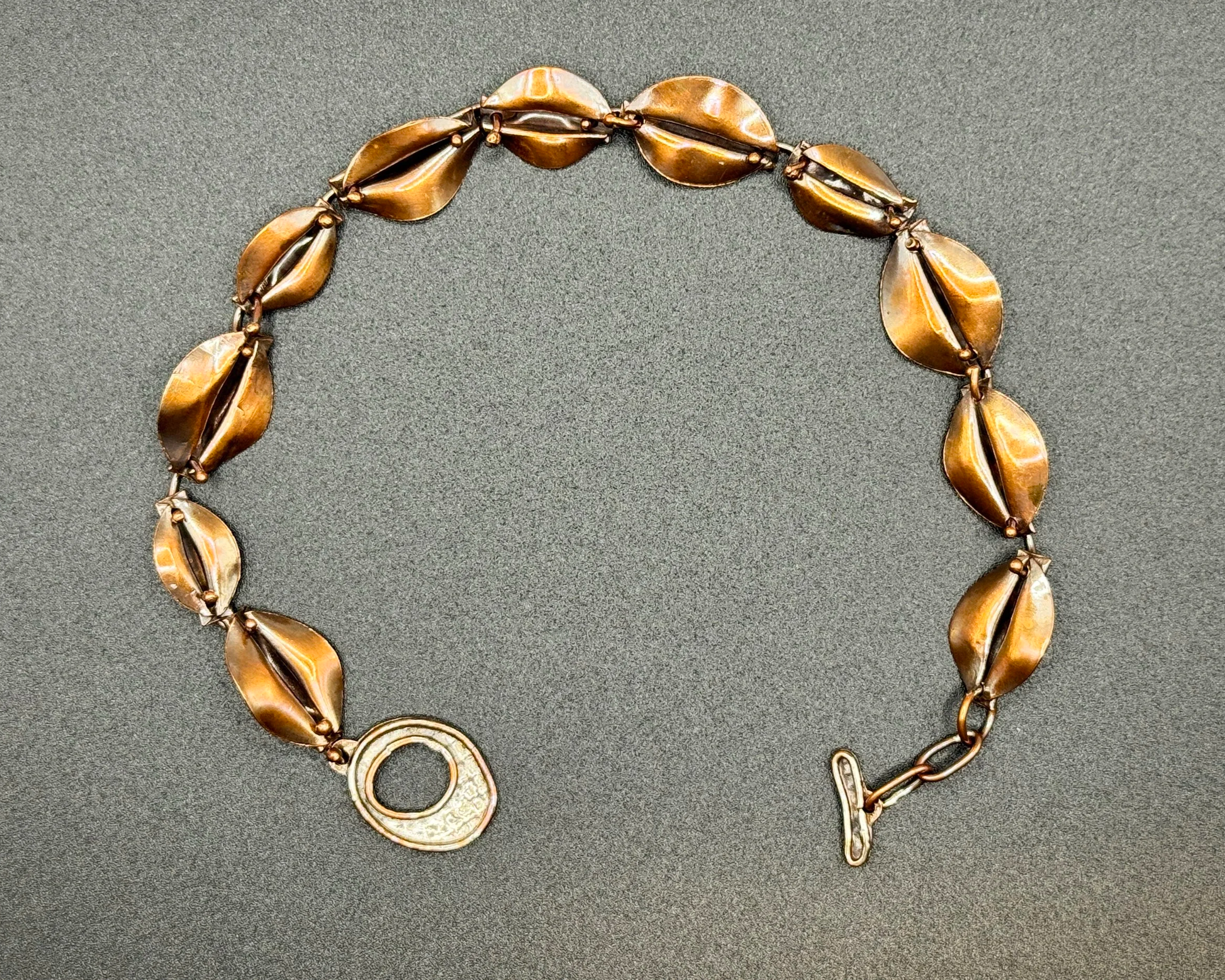 bracelet:  fold-formed copper with patina