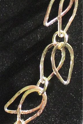 detail:  bracelet, brass & sterling silver