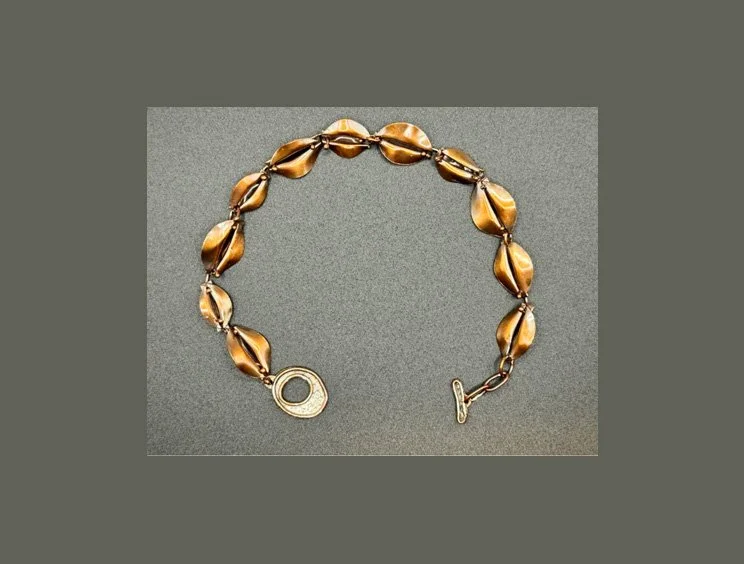 bracelet: fold-formed copper with patina
