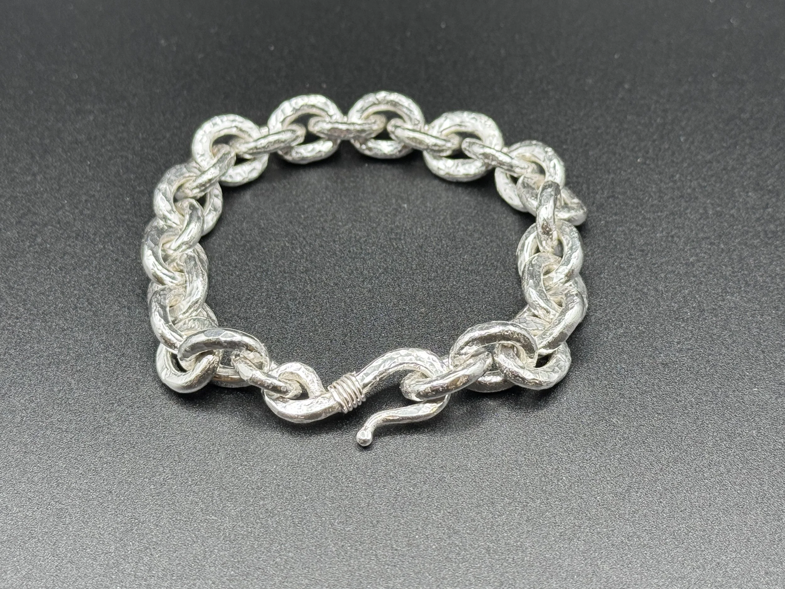 man's bracelet:  hand forged and textured heavy link sterling silver with J-hook clasp