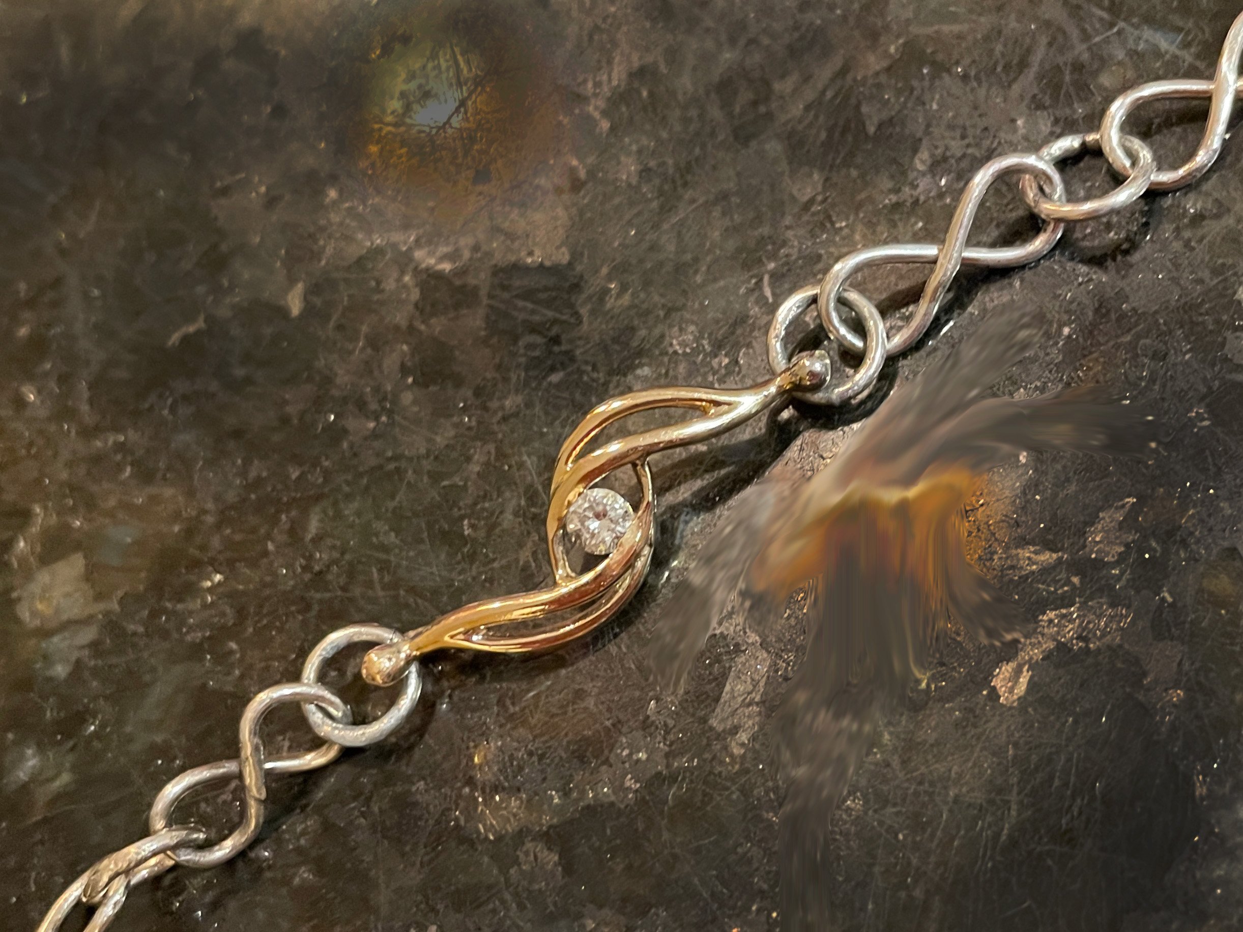 wedding bracelet:  14k gold, .75kt diamond, sterling silver