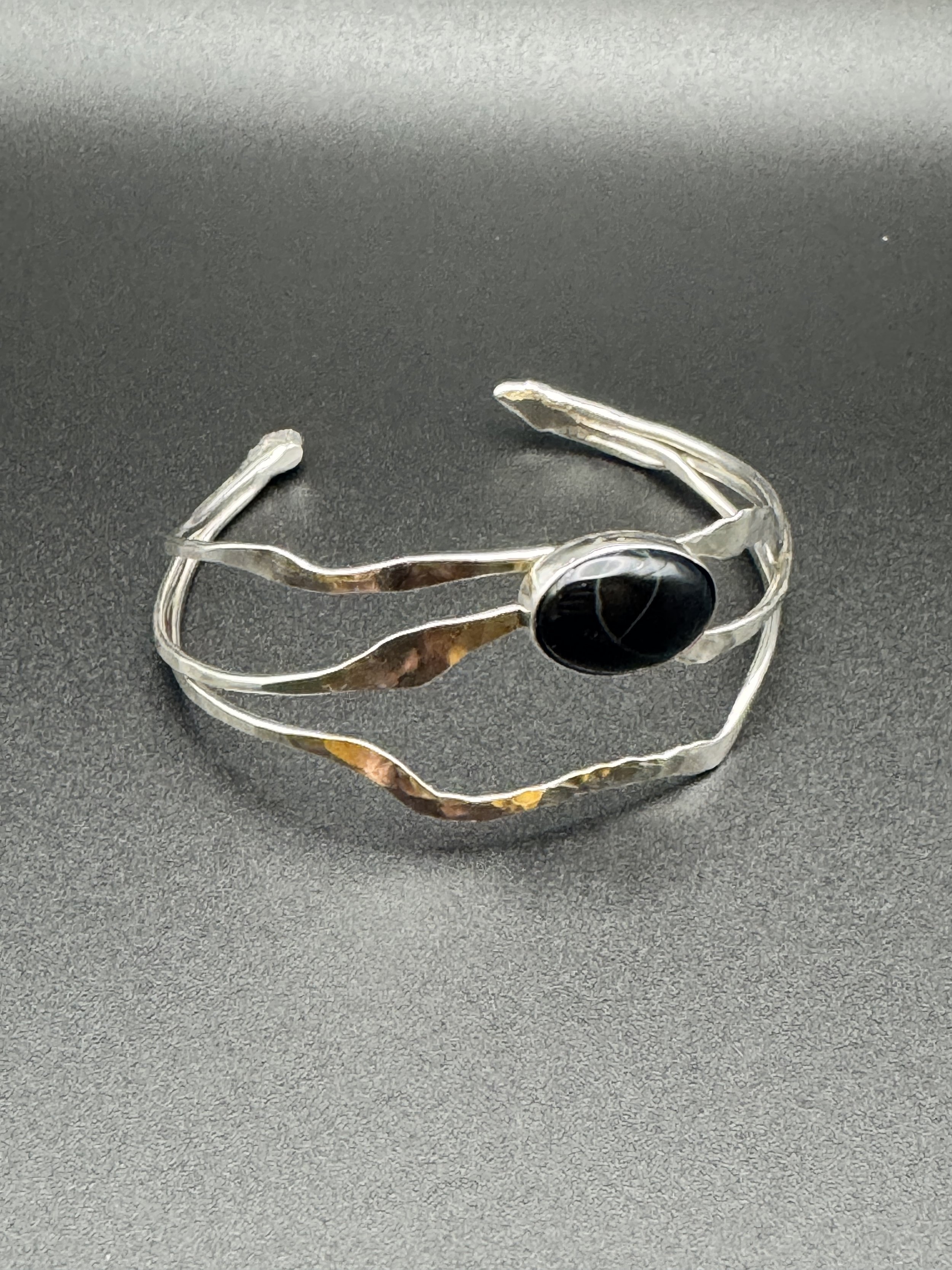 bracelet: sterling silver, onyx cabochon