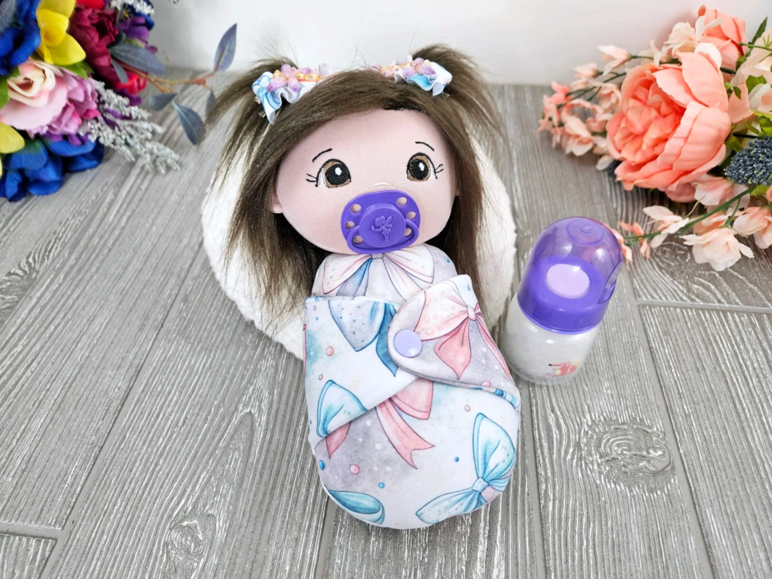 Swaddle baby doll 10 inch, brown hair and eyes