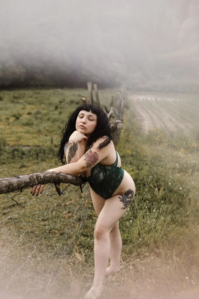Intimate outdoor boudoir image of Margarida in the forest captures natural beauty, confidence, and a sophisticated boudoir aesthetic.