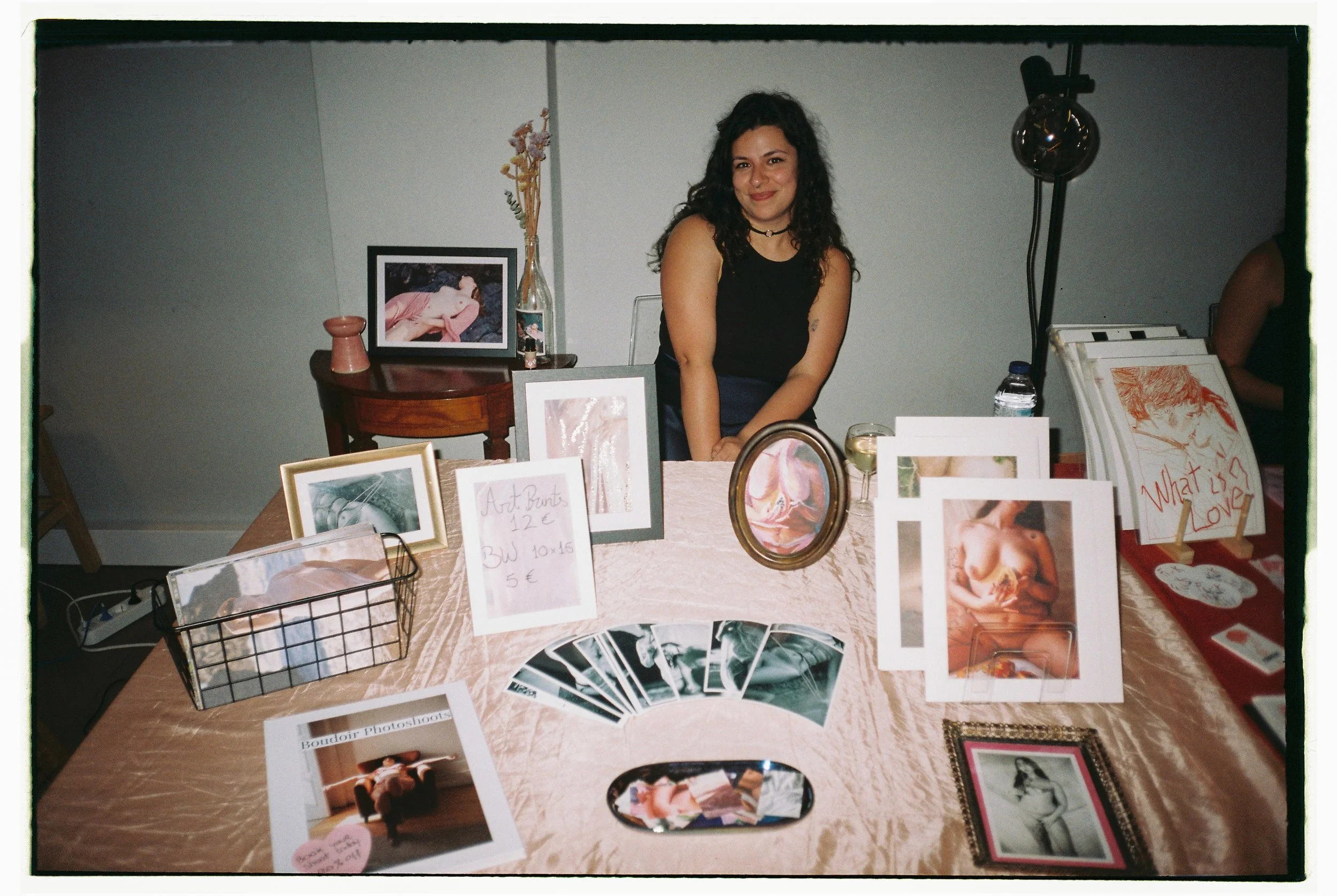 girl selling in a art market