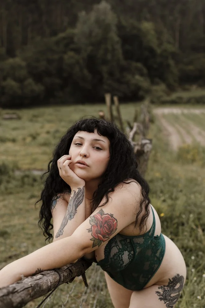 Intimate outdoor boudoir image of Margarida in the forest captures natural beauty, confidence, and a sophisticated boudoir aesthetic.