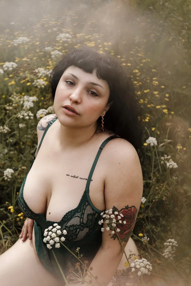 Intimate outdoor boudoir image of Margarida in the forest captures natural beauty, confidence, and a sophisticated boudoir aesthetic.