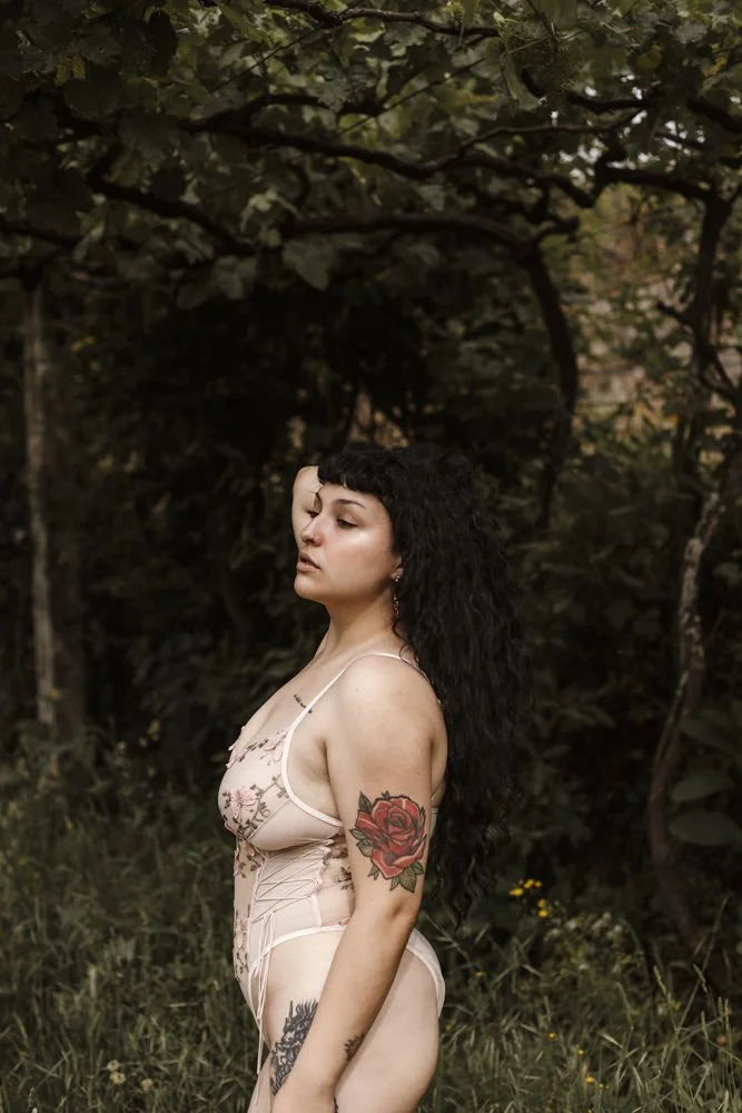 Intimate outdoor boudoir image of Margarida in the forest captures natural beauty, confidence, and a sophisticated boudoir aesthetic.