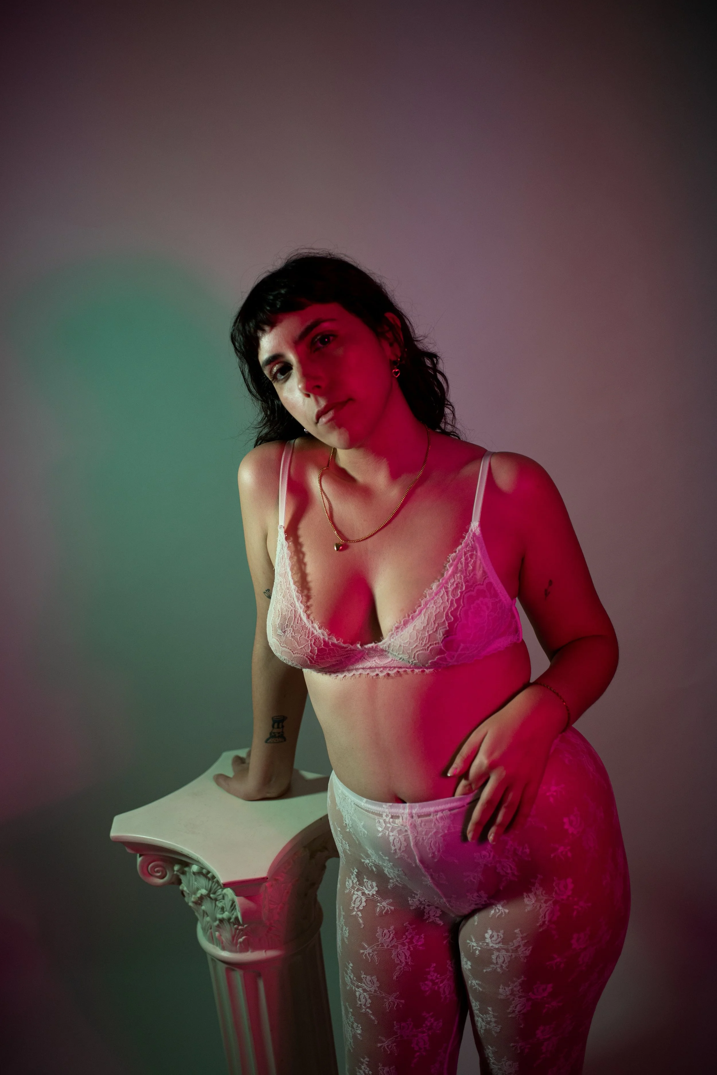 a woman in white lingerie posing with cenematic light