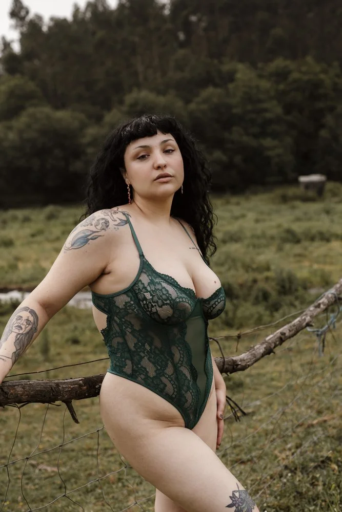 Intimate outdoor boudoir image of Margarida in the forest captures natural beauty, confidence, and a sophisticated boudoir aesthetic.
