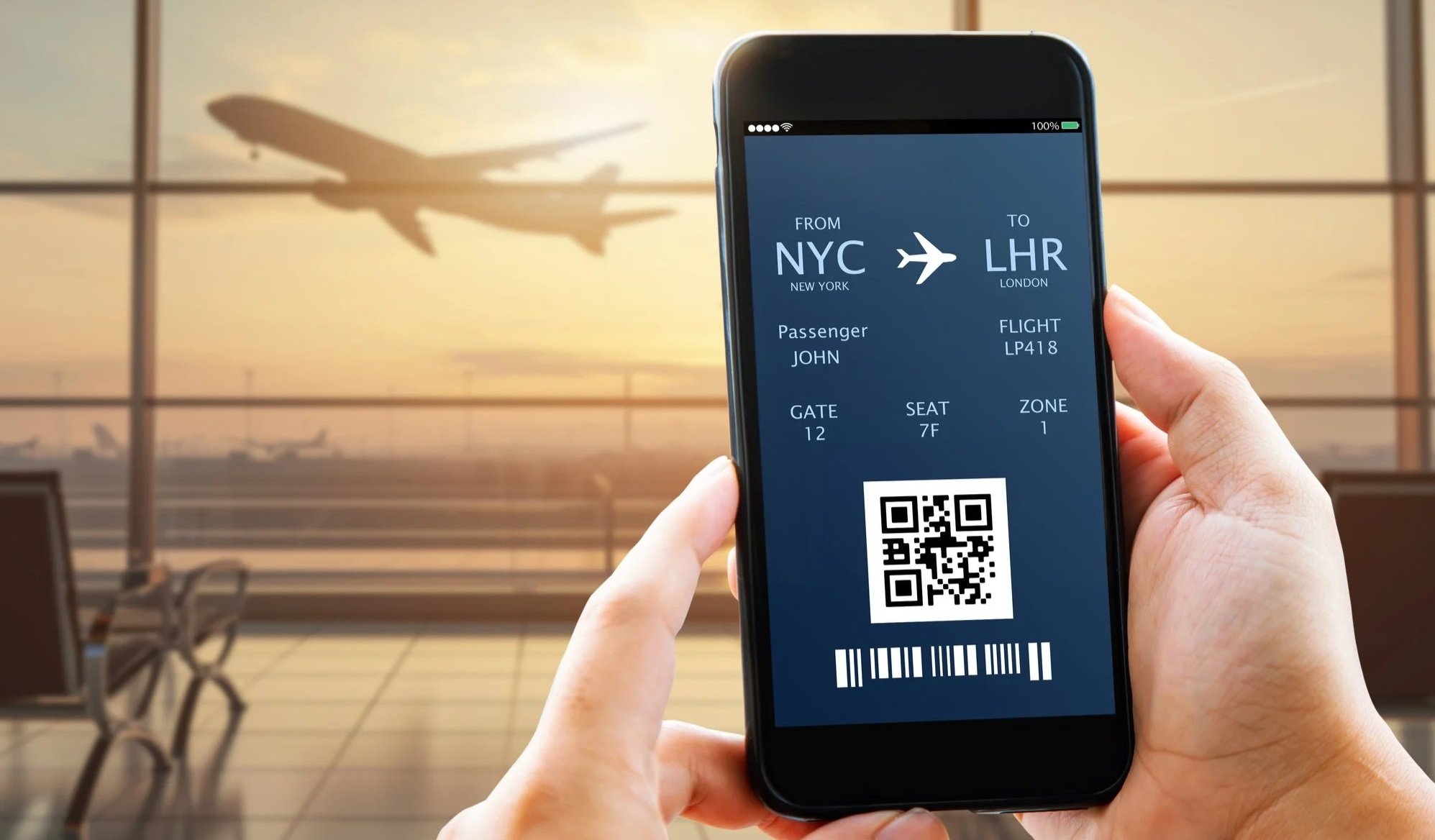A person holding a smartphone displaying a boarding pass for a flight from NYC to LHR. The boarding pass includes passenger name John, flight number LP418, gate 12, seat 7F, zone 1, with a QR code and barcode. In the background, planes are taking off or landing at an airport during sunset.