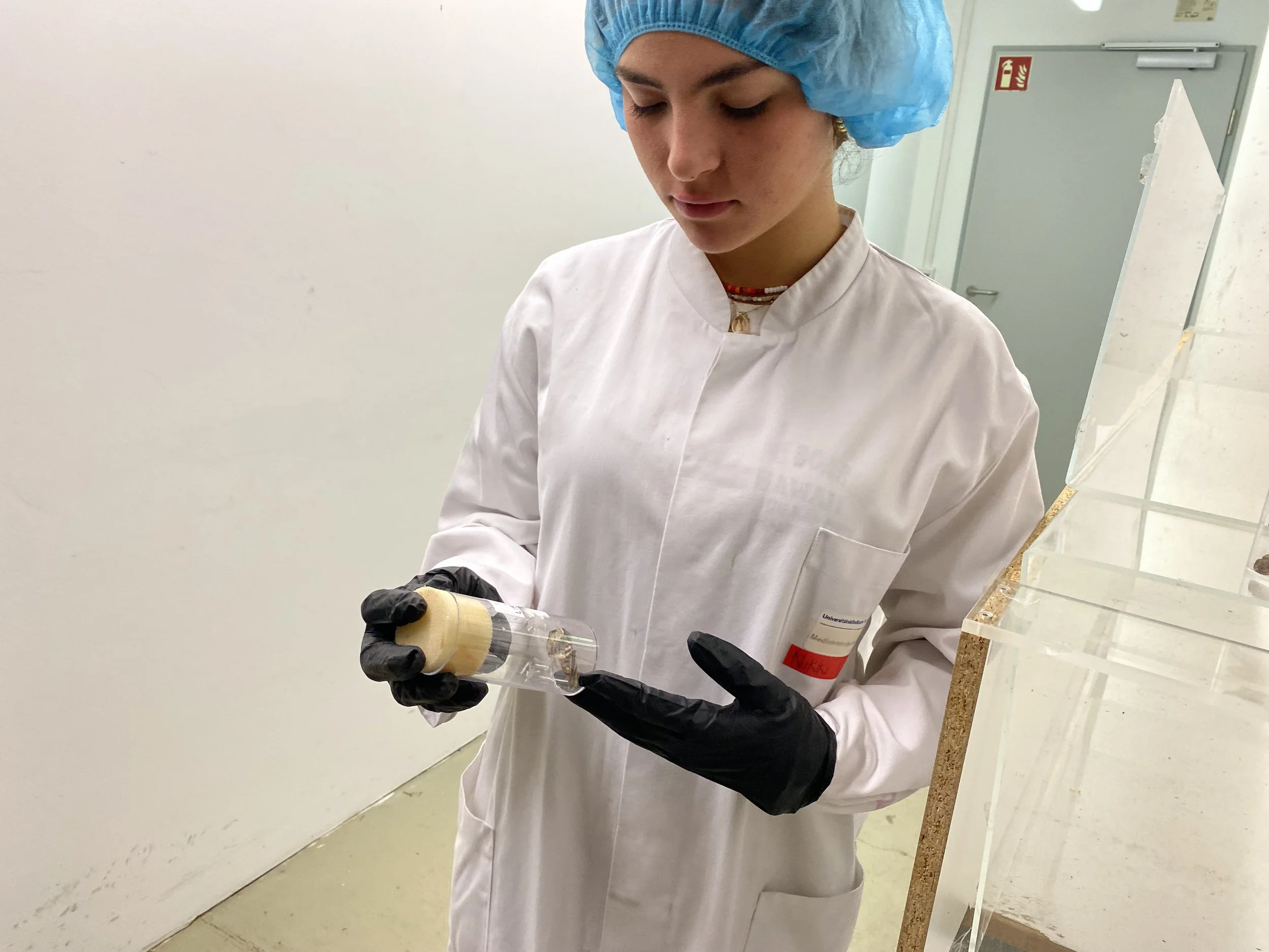 With gorro looking at moth.jpeg