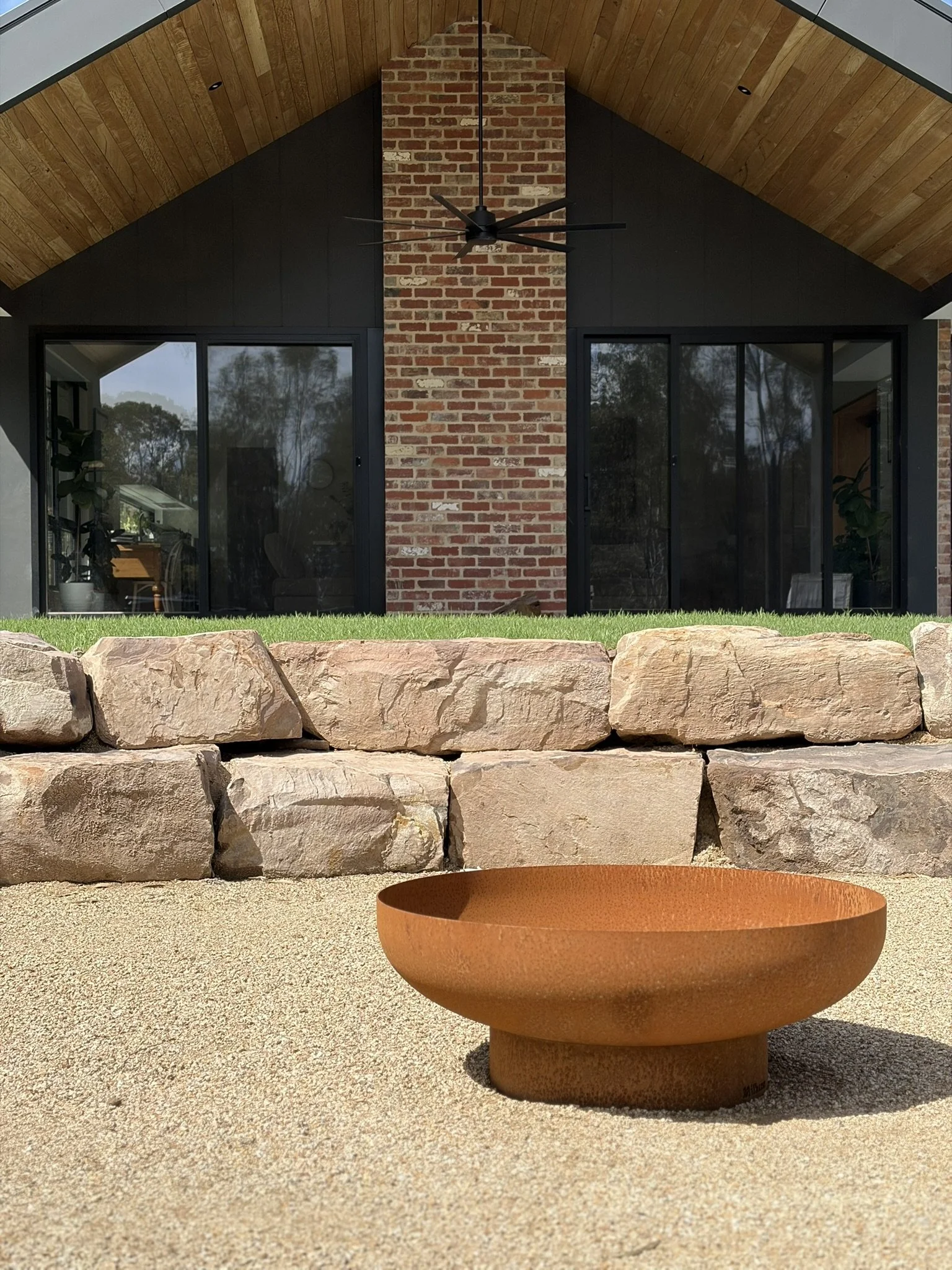 fire pit, rock retaining wall.jpeg