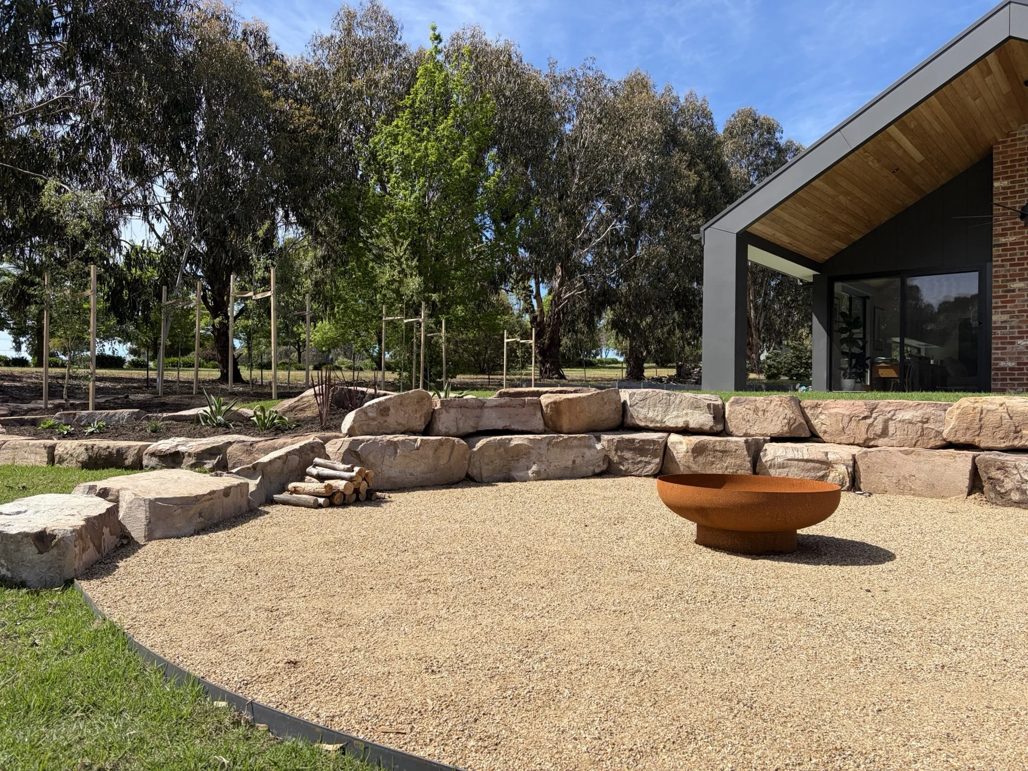 fire pit, rock retaining wall 2.jpeg