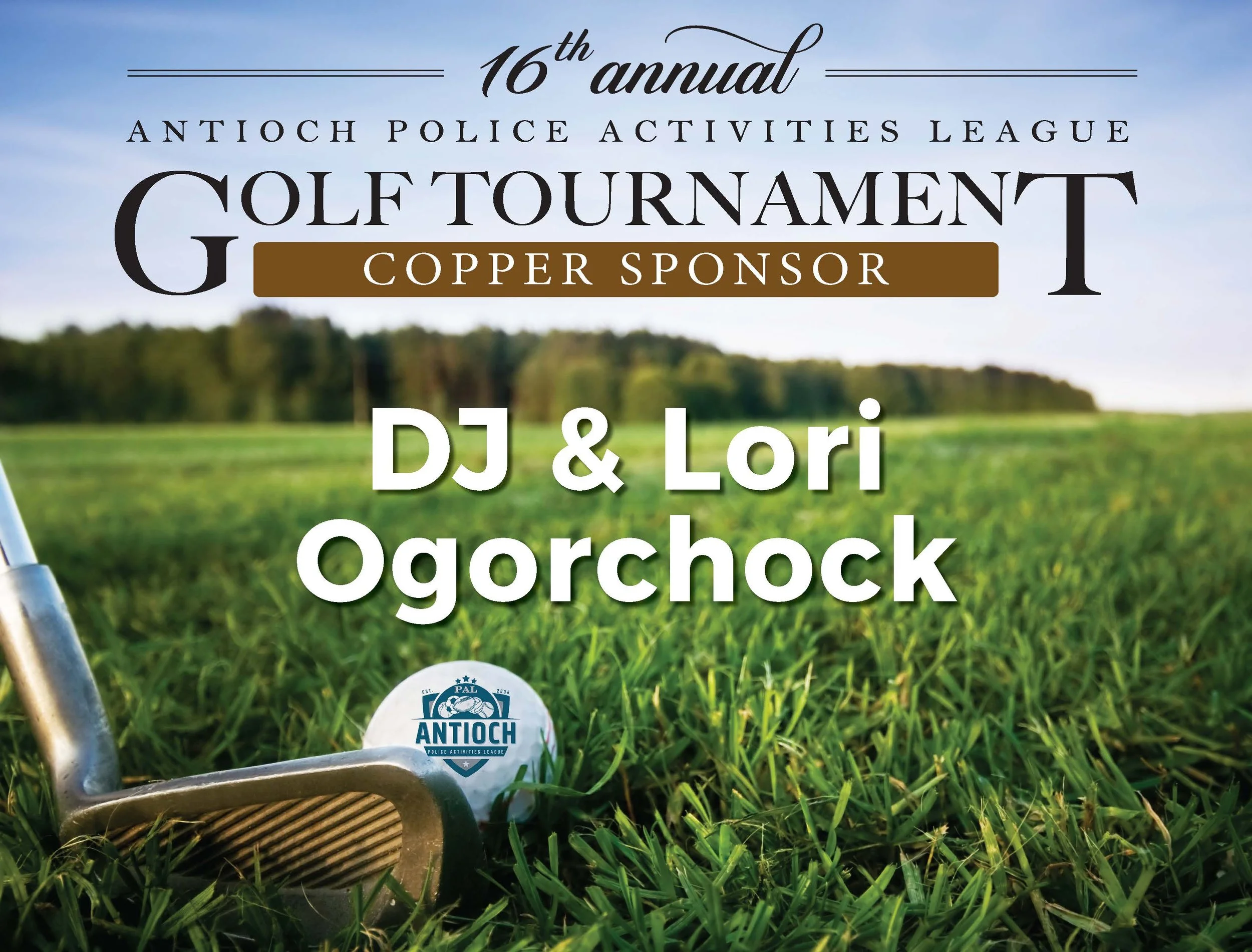 A promotional sign for the 16th annual Antioch Police Activities League golf tournament, sponsored by Copper, set outdoors on a grassy field with trees and a clear sky in the background. A golf club and golf ball with the league's logo are visible in