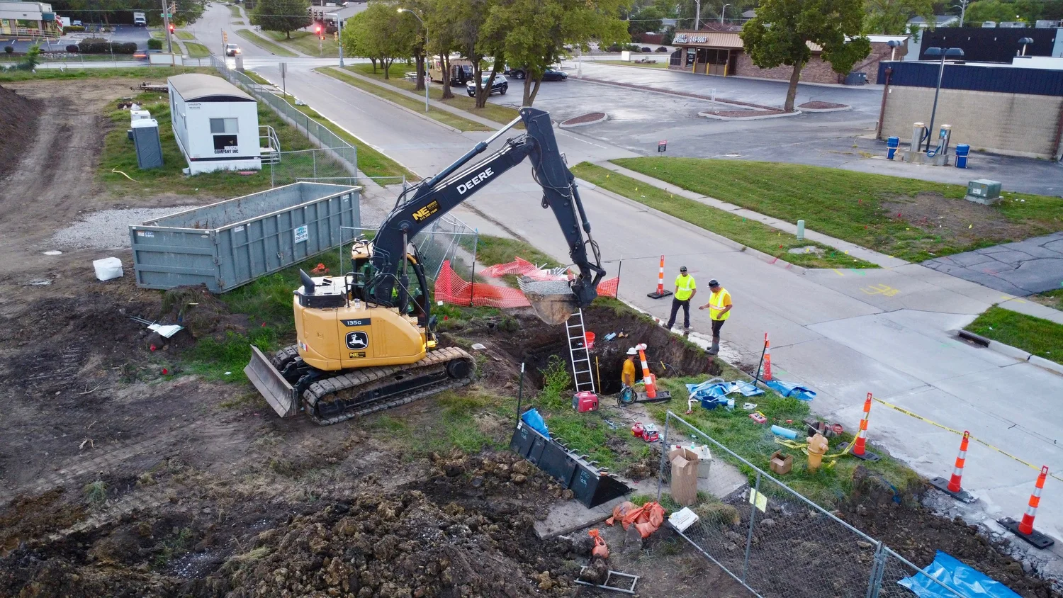 Cliff Contracting crew performing utility excavation on a Central Iowa street
