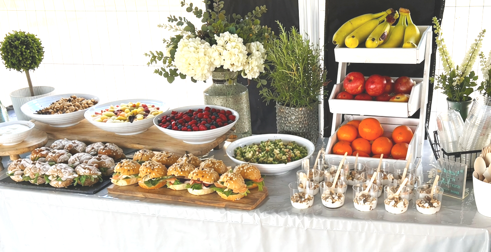 A traditional Portuguese dish salsichas com couve lombarda - a dish of frankfurters wrapped and cooked in cabbage leaves, served with warm vegetables and rice - Couple of Natas Catering, Film and TV television catering. Hot boxing, on site location 