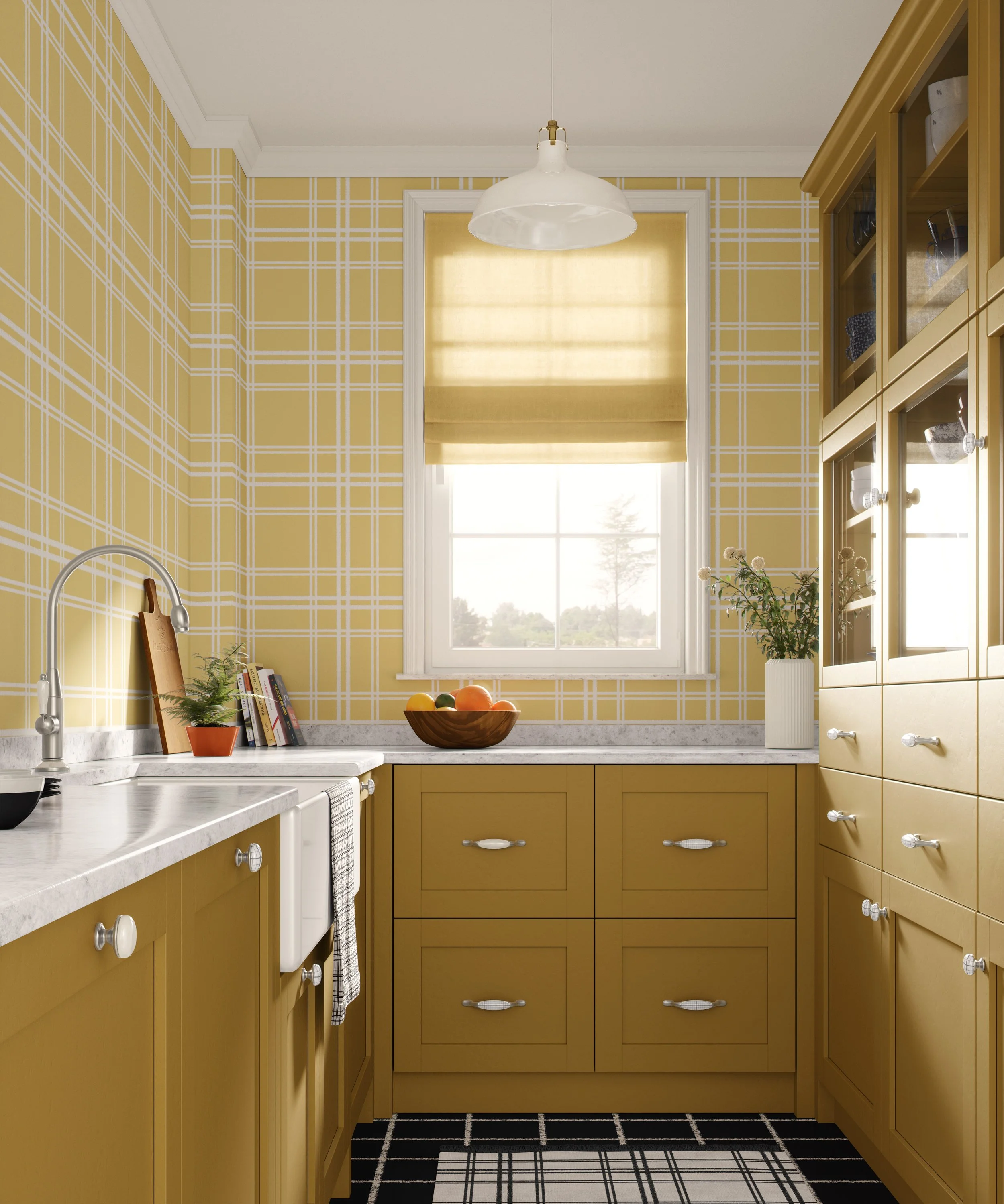 A bright yellow kitchen with plaid patterned wallpaper, white window frame with beige shade, white marble countertop, yellow cabinetry with white knobs, black and white checked rug, and various kitchen items including a bowl of fruit and plants.