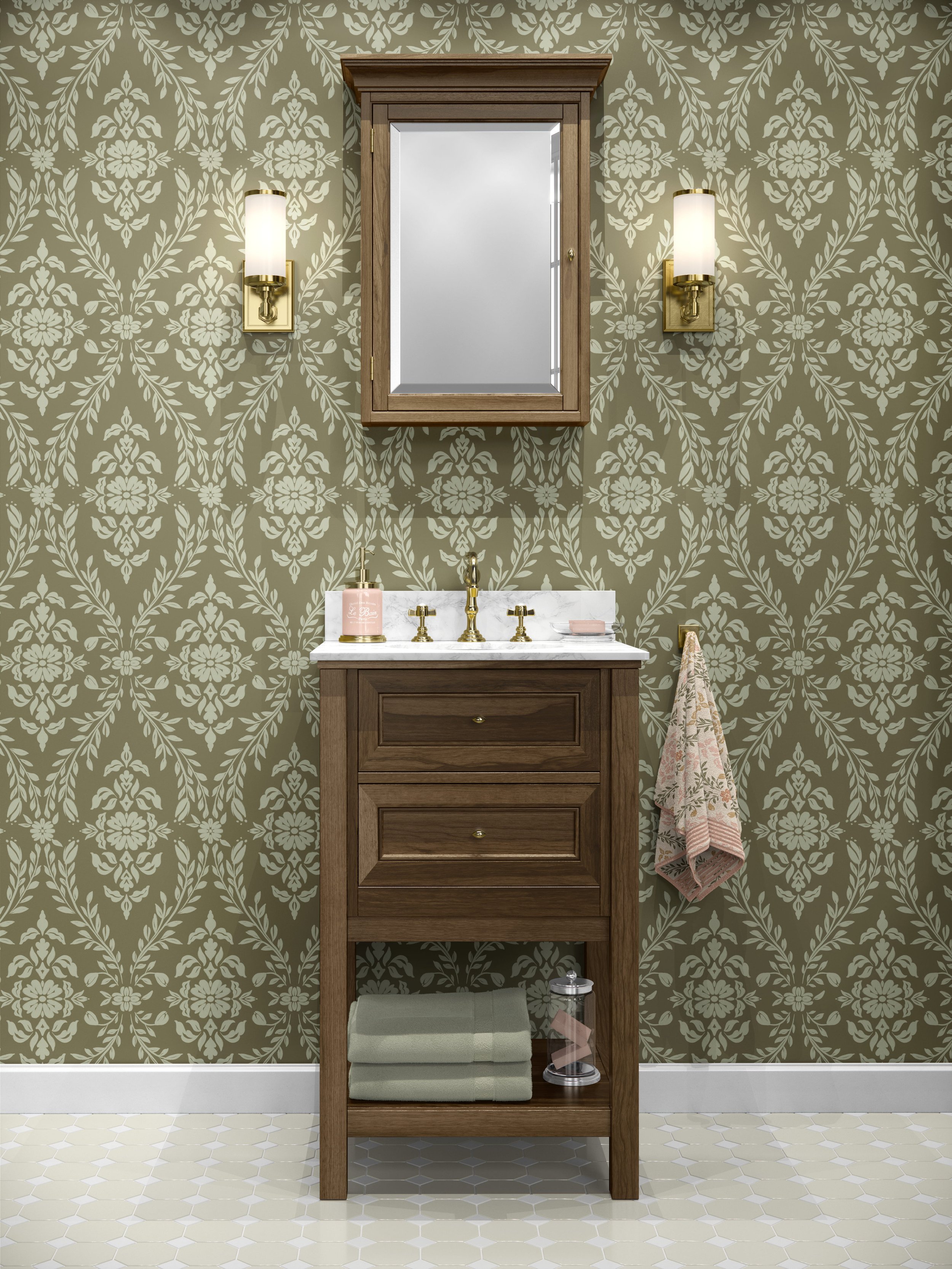 A bathroom vanity with a wooden cabinet, a marble countertop with gold fixtures, a mirror, and two wall-mounted lights, featuring a patterned wallpaper with floral damask motifs in pale green on an olive green background, and a hexagonal tile floor.