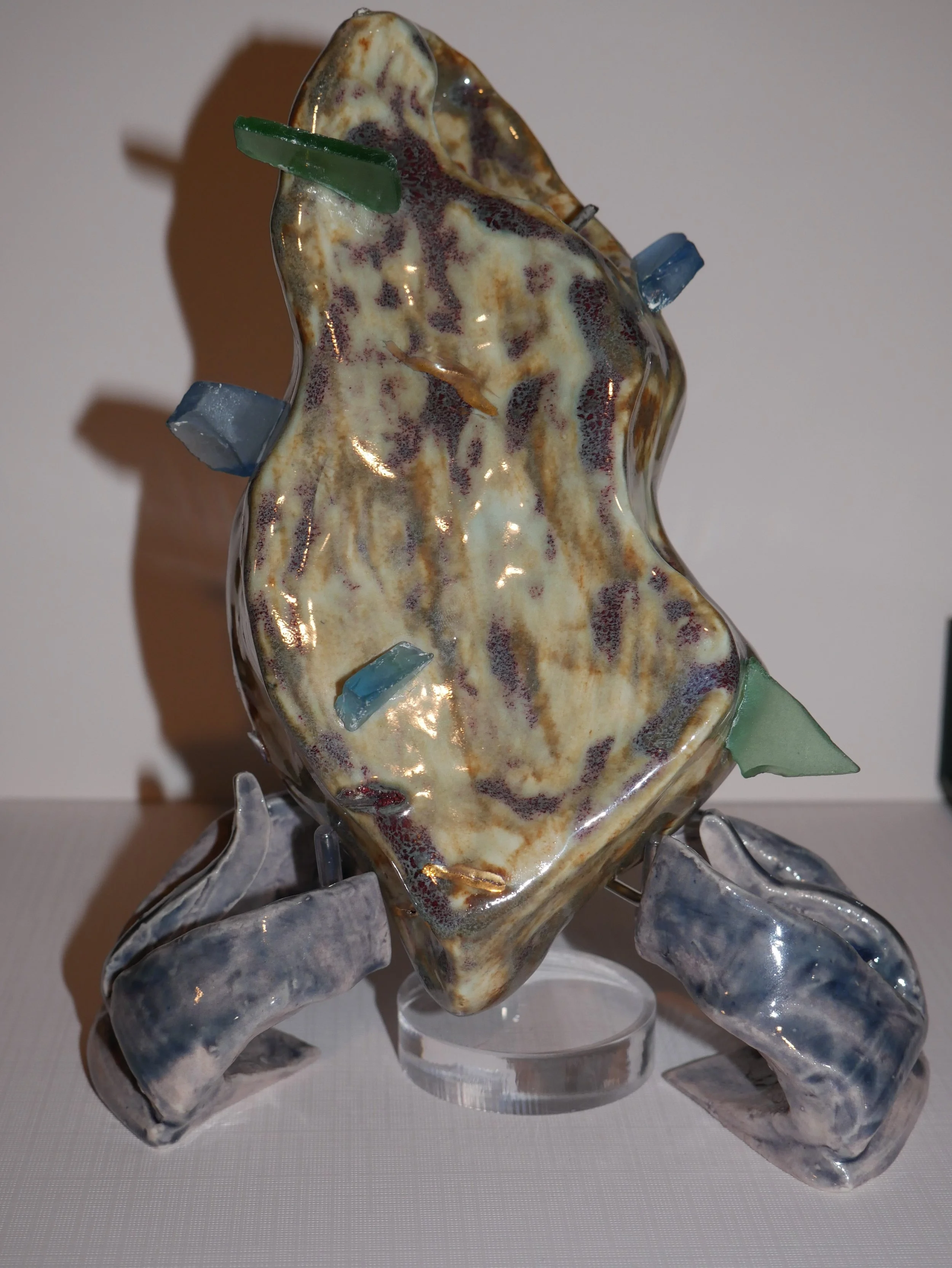 Handcrafted ceramic art sculpture with organic textures and modern design by Reclaym. Unique decorative statement piece for home or gallery spaces.