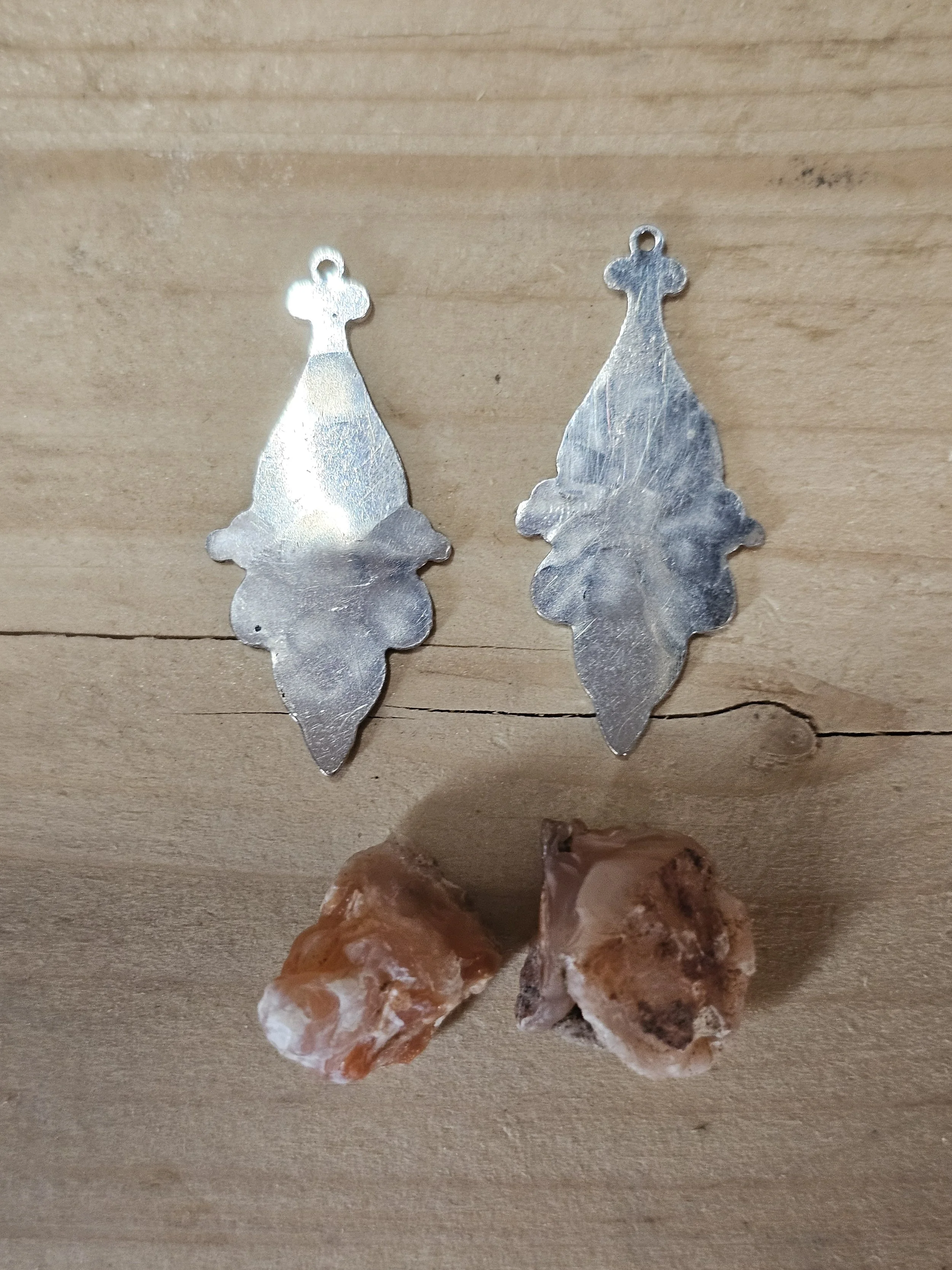 Aluminum Stamping blanks and carnelian agates in the rough ready for creation.