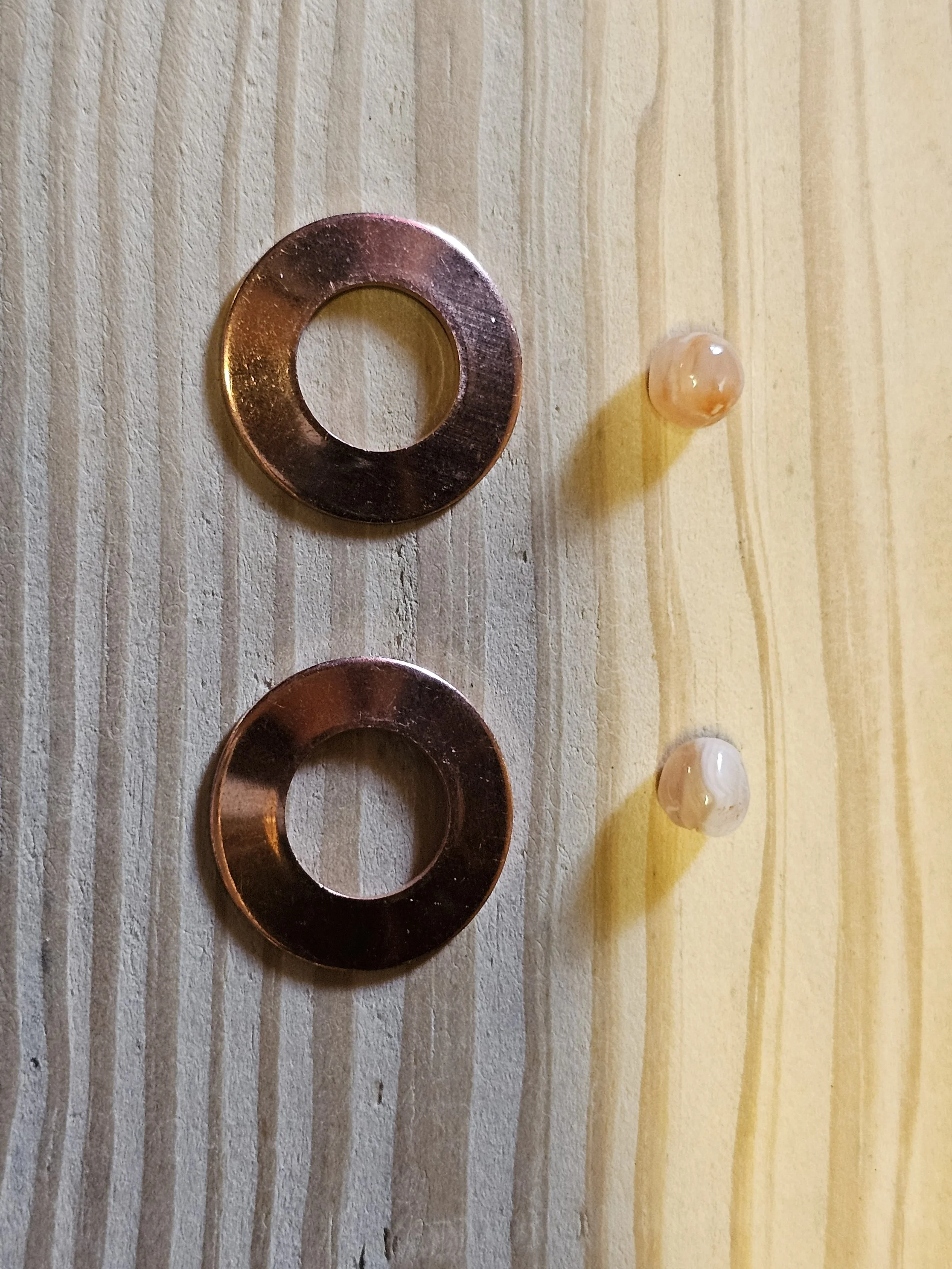 Rose gold plated stamping blanks with cut and polished carnelian agates ready for creation. (Plan B)