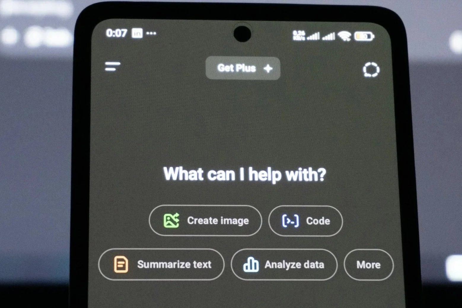AI screen shown on a phone with a blurred background