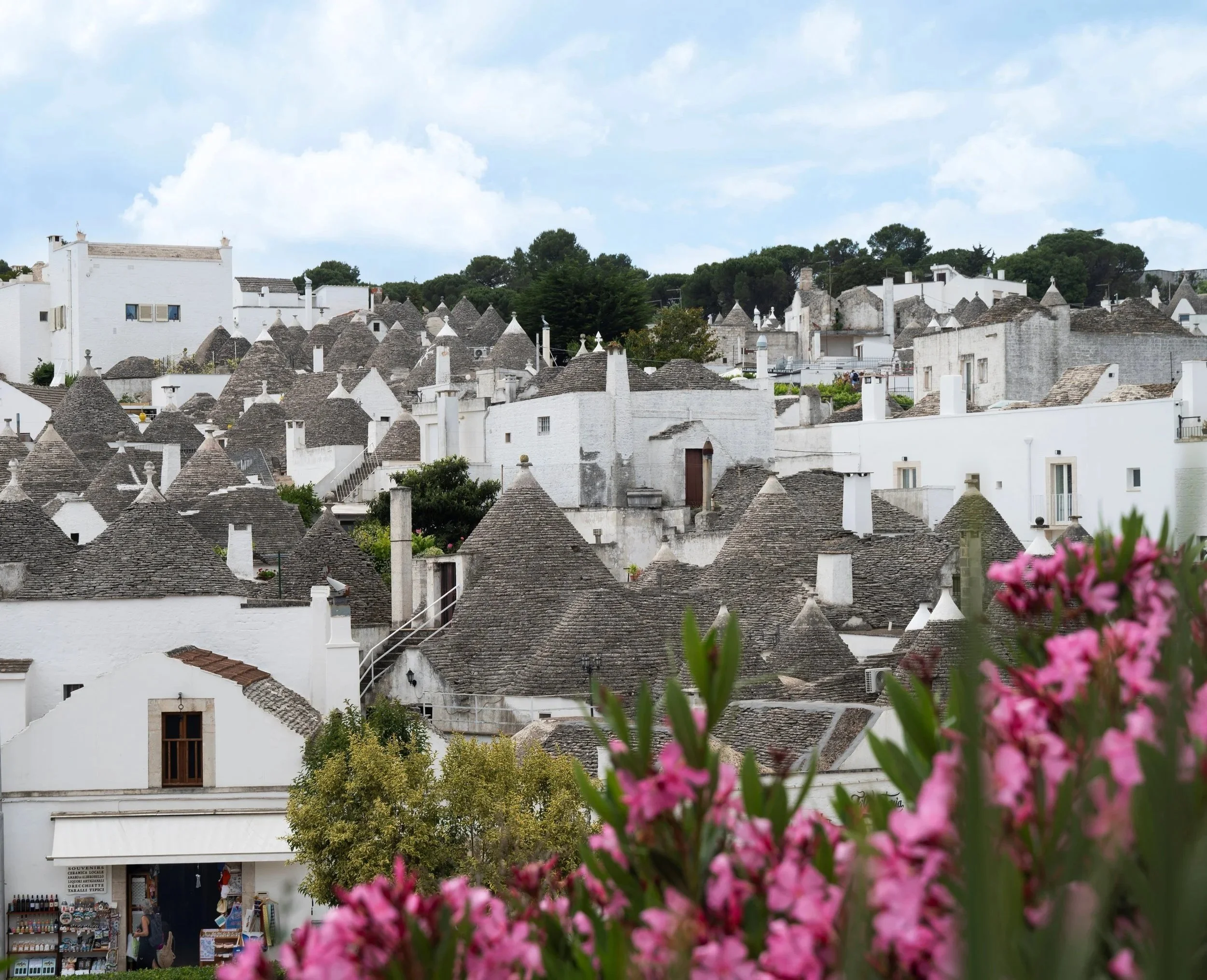 'Trulli' Traditional whitewashed conical-roofed stone huts, Alberobello, Puglia, Italy