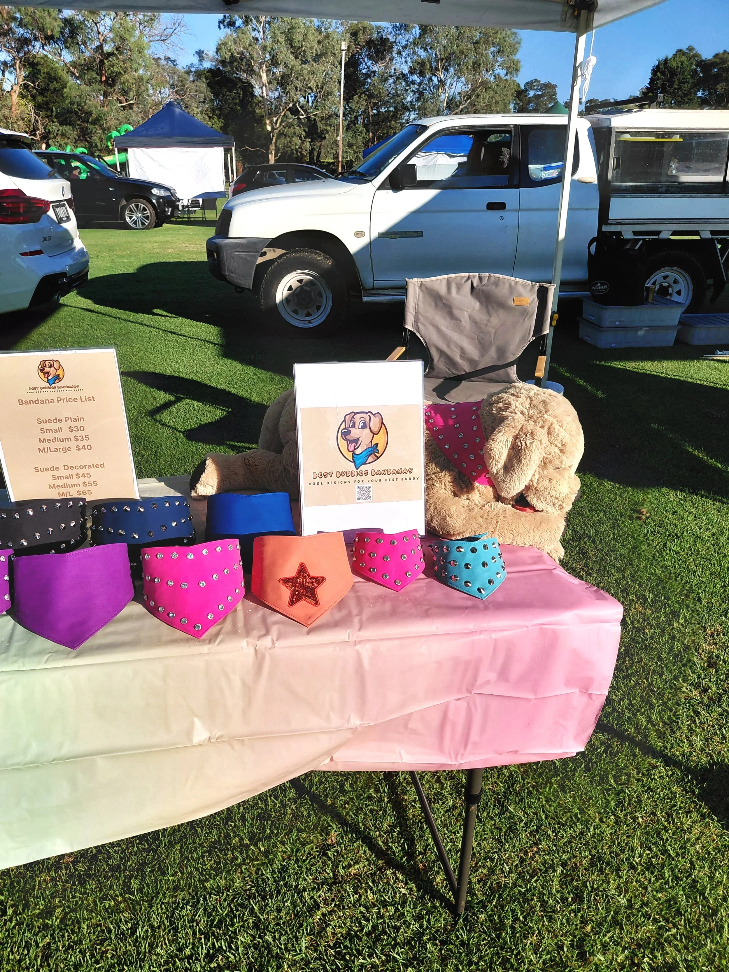 Dog bandana stall displaying studded dog bandanas and diamante dog bandanas.
