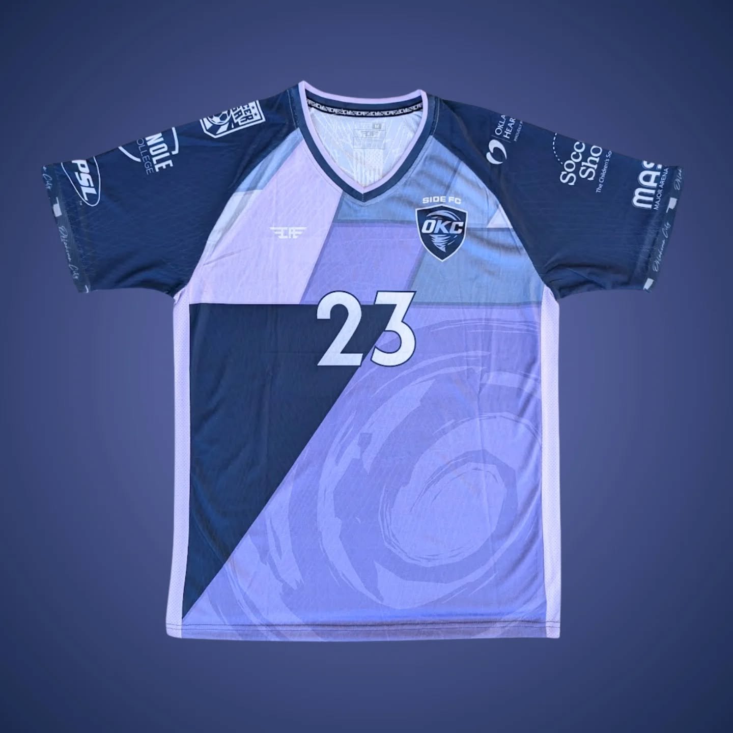 Purple and navy patchwork jersey with number 23 on the front