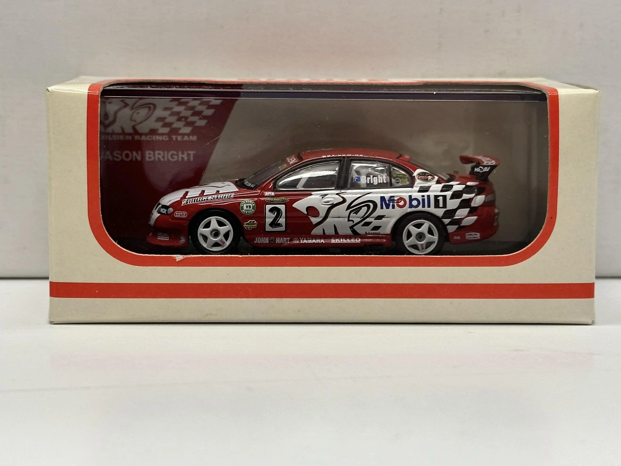 1:64 SCALE HOLDEN VX COMMODORE 2002 HRT JASON BRIGHT
