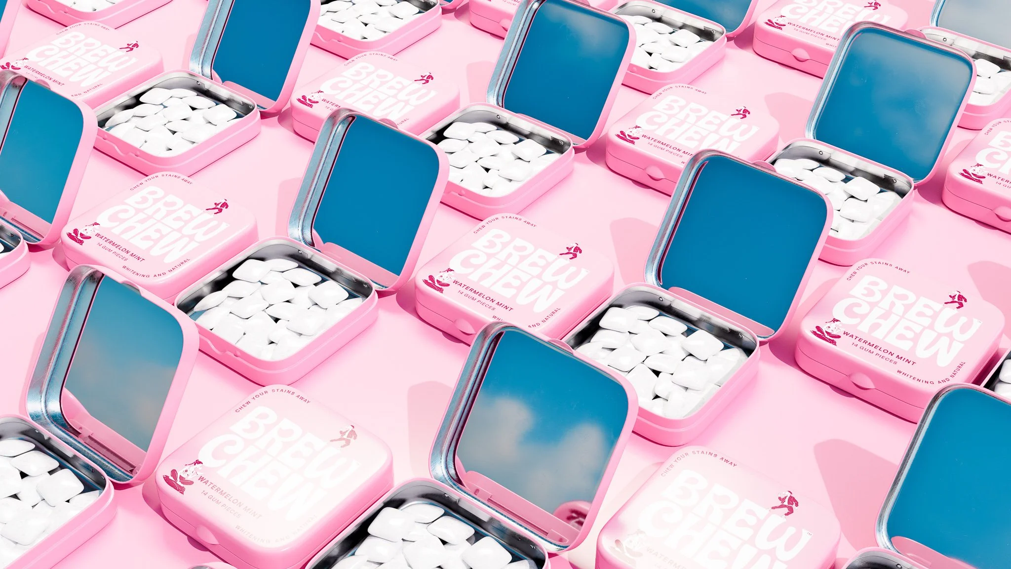 Multiple pink tins of watermelon mint gum with open mirrors reflecting the blue sky and white clouds, arranged on a pink surface.