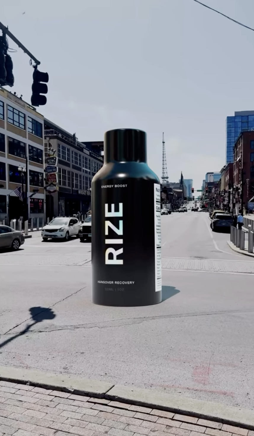 A large digital advertisement for a product called 'RIZE' positioned on a city street, with cars and buildings in the background.