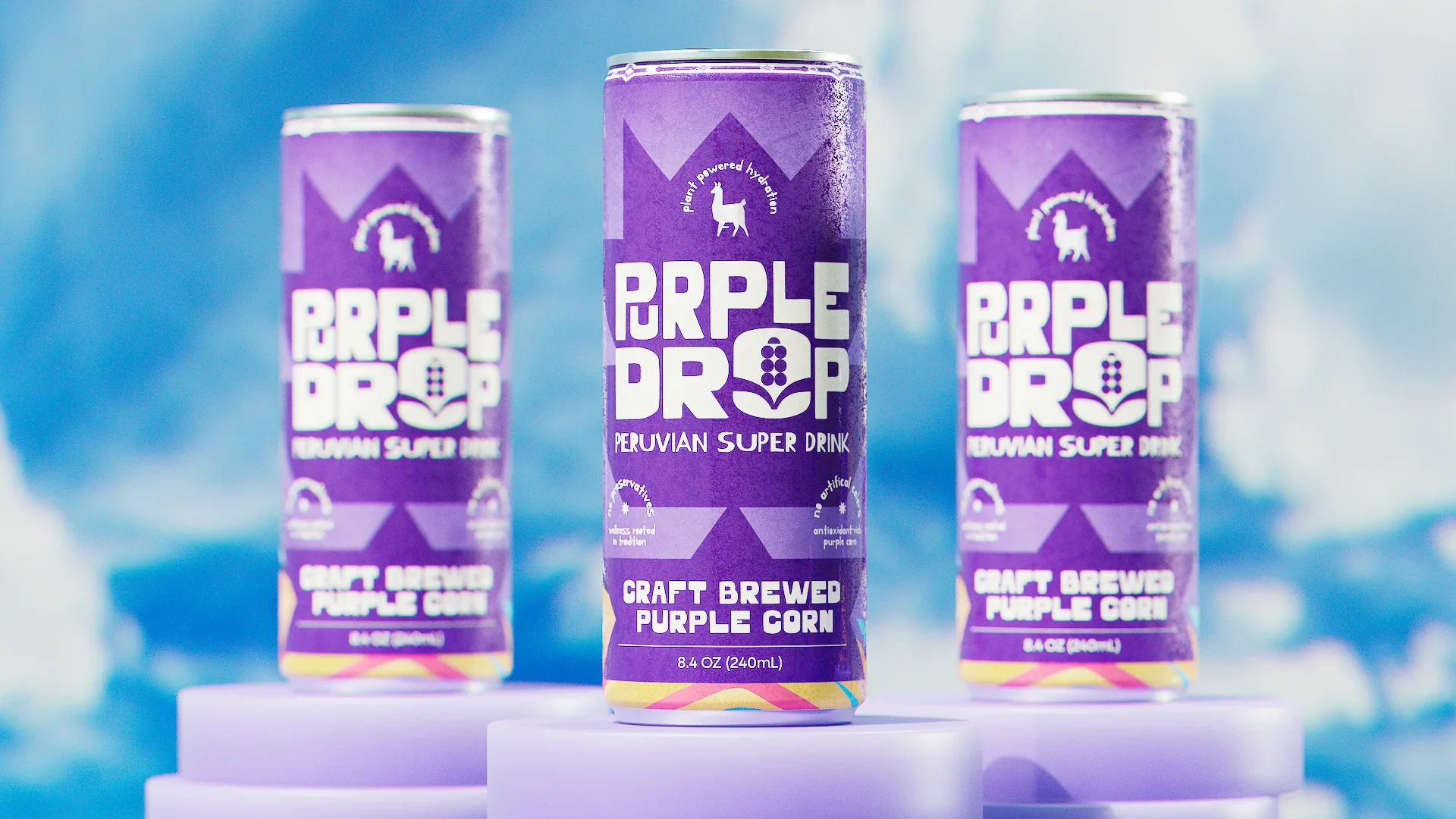 Three cans of Purple Drop Peruvian Super Drink with purple packaging on white platforms against a blue background.