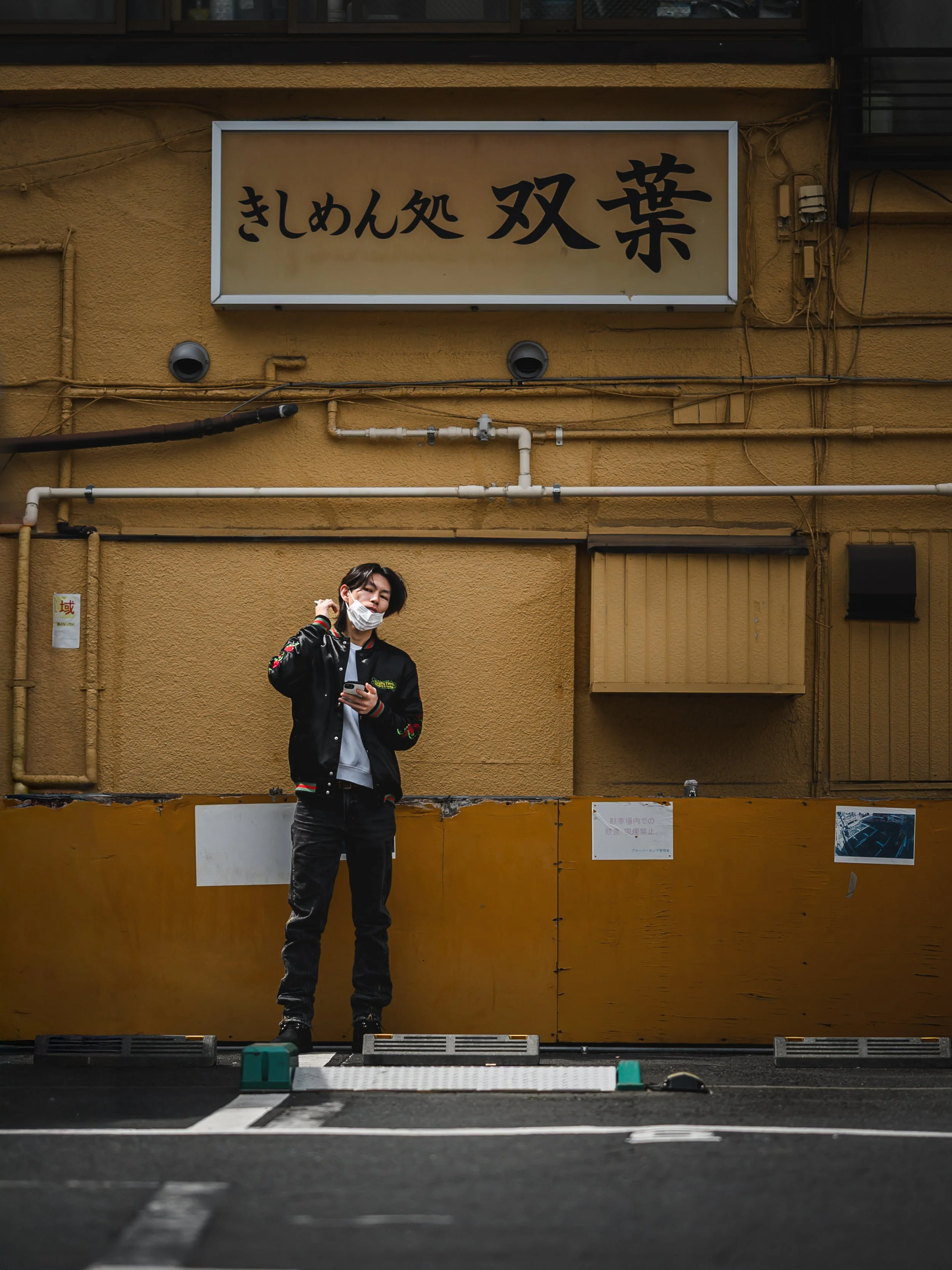 man against yellow wall.jpg
