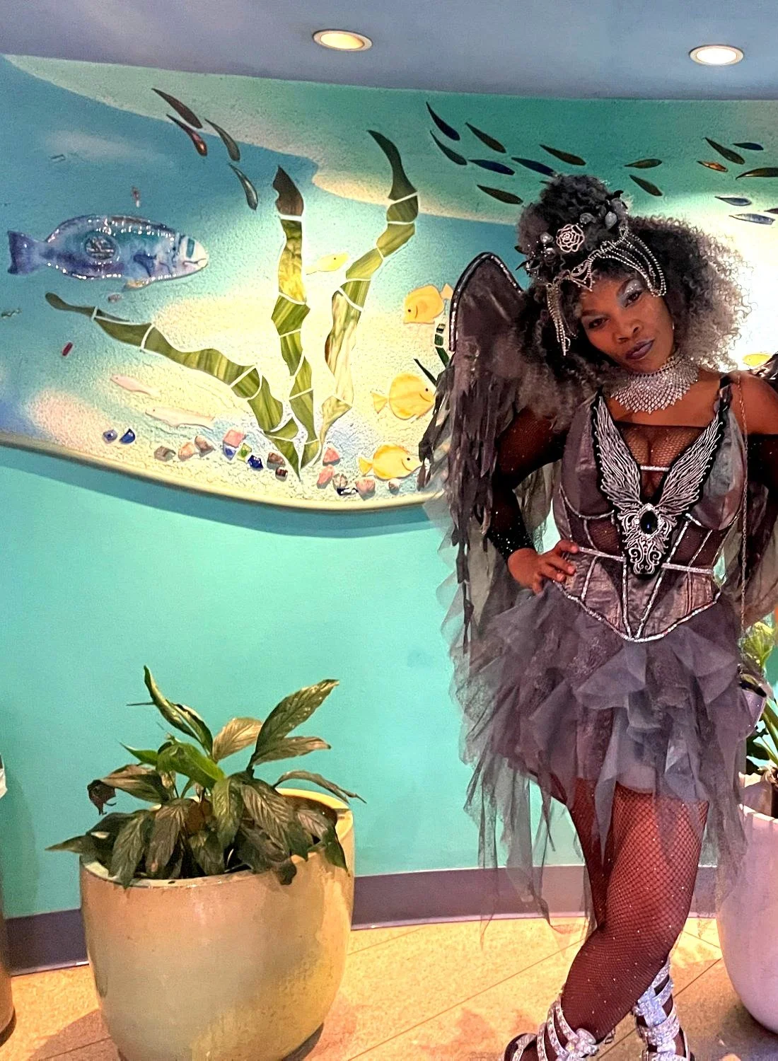 ArandomLady living art installation fallen angel dark fairy on halloween Hawaii