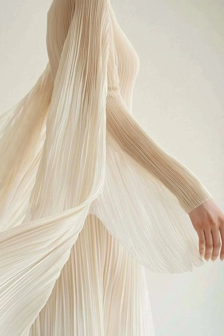 flowy white dress, representing divine feminine energy