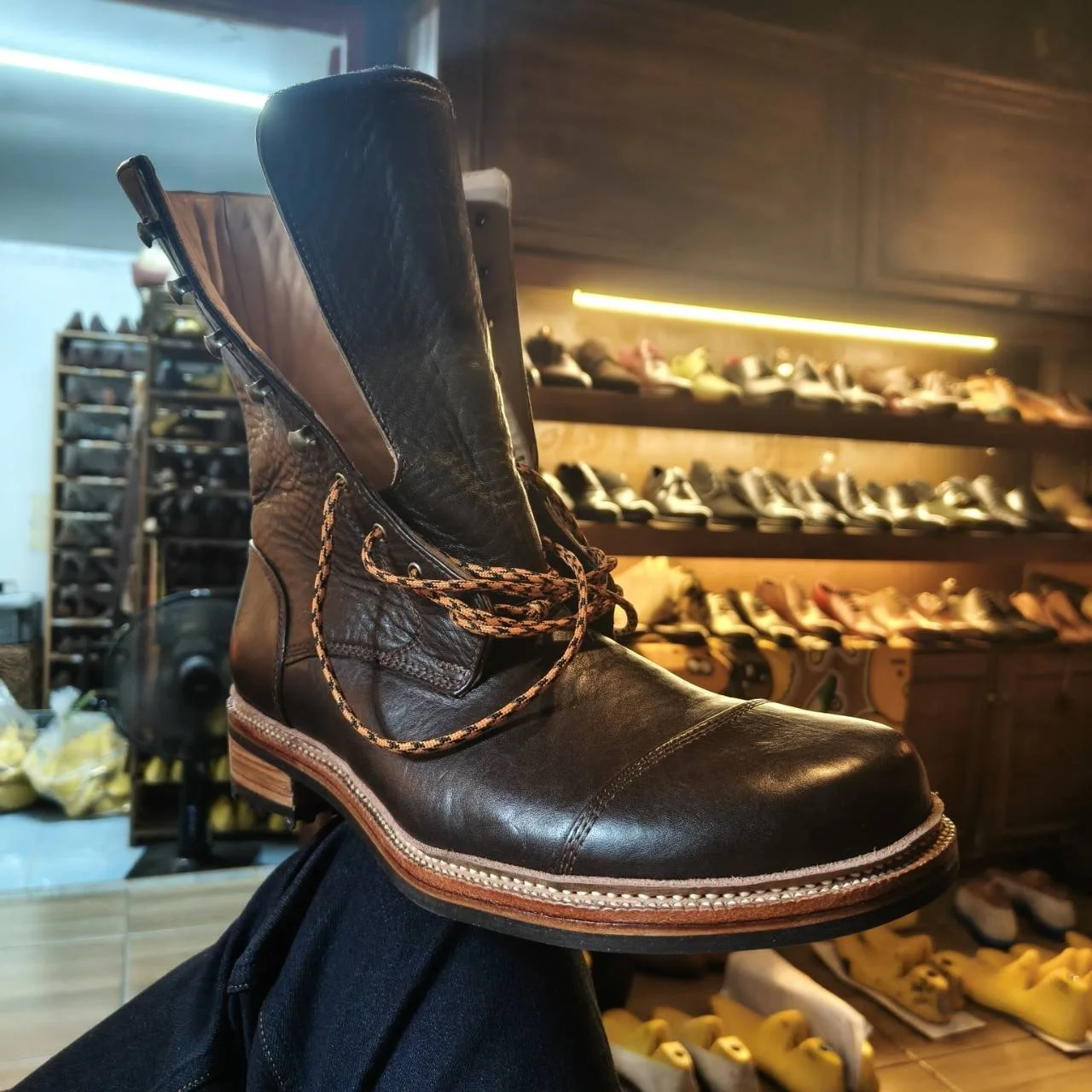 a close up of a hand welted Dante boot from Naang Boots