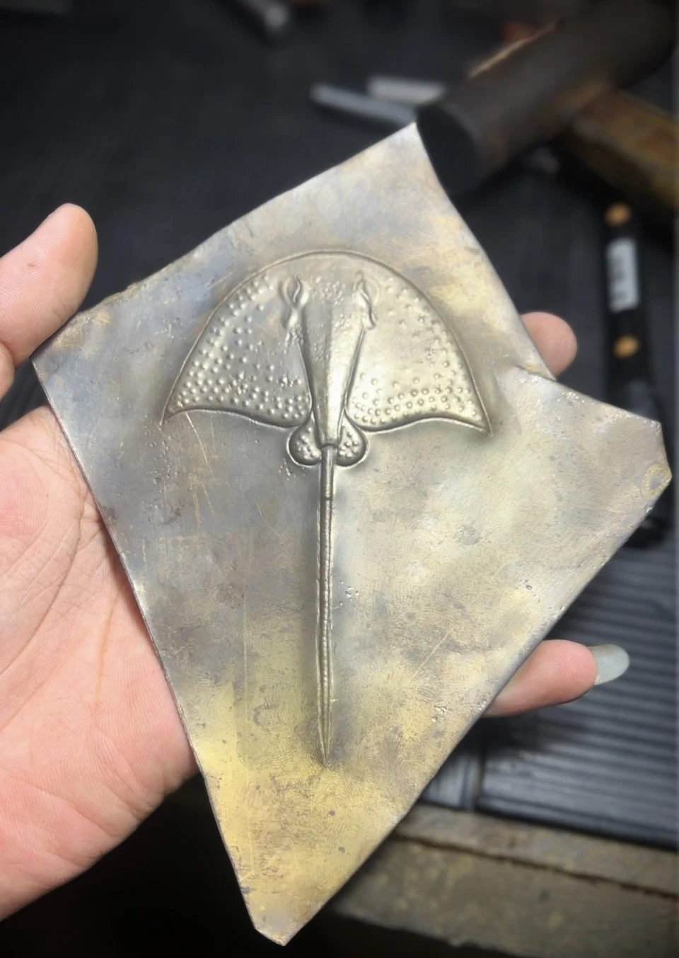 Hand hammered brass stingray toe plate for a chelsea boot