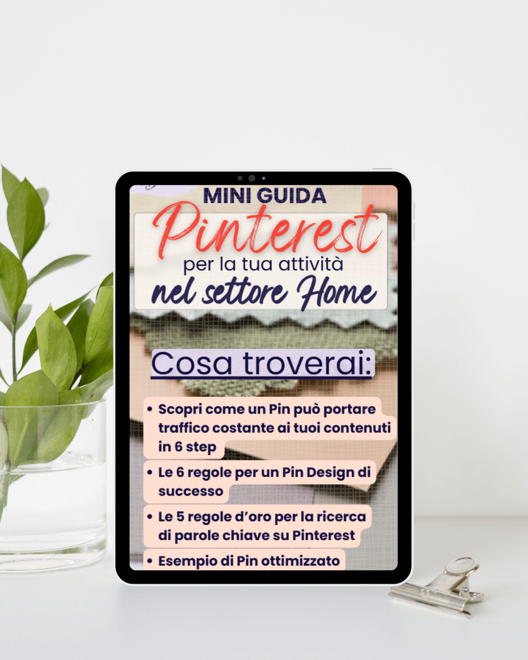anteprima della mini guida gratuita pinterest su schermata tablet poggiato su tavolo bianco, piccolo vaso trasparente con piantina