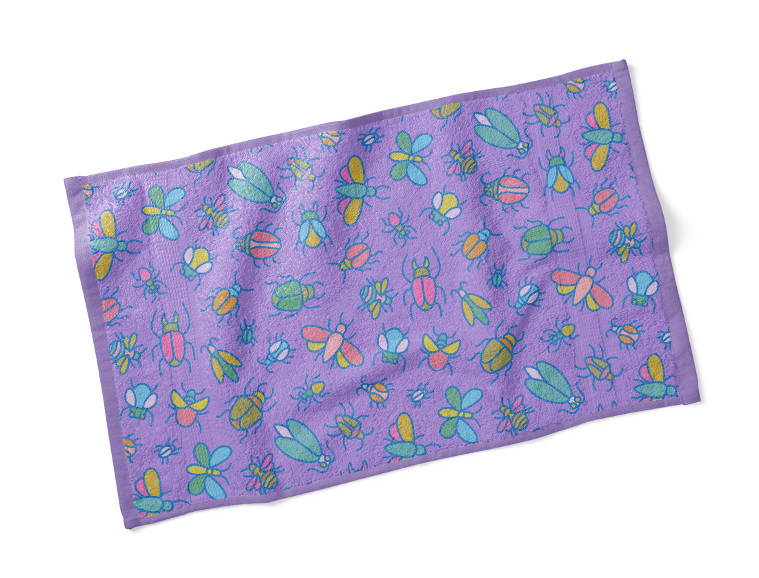 Beach towel with neon colored pattern of illustrated bugs