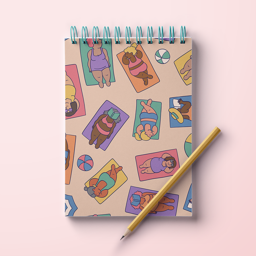 Mockup of a spiral notepad featuring illustrated pattern of diverse fat women lounging on the beach