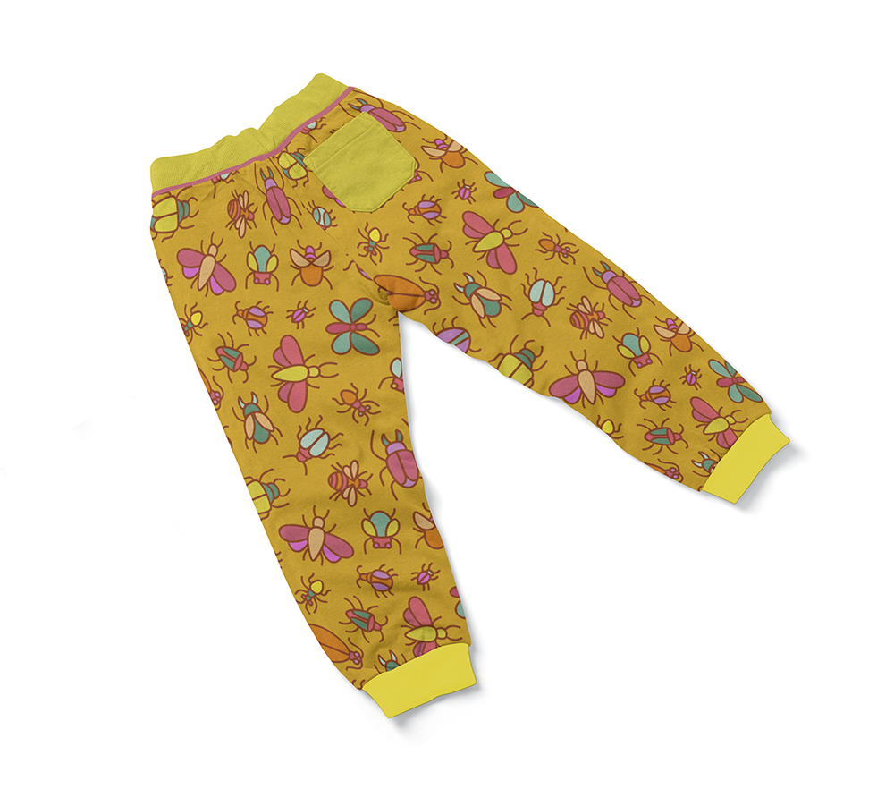 Baby jogger pants with illustrated pattern of bugs on a yellow background