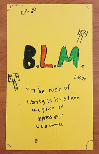Protest poster by young workshop participants: "BLM The cost of liberty is less than the price of repression - WEB DuBois"