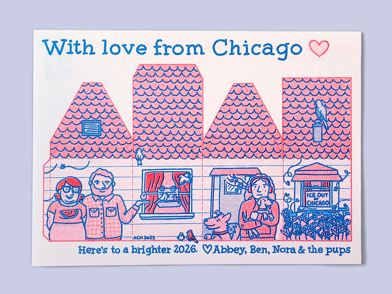 New years card in blue and red with text "With Love from Chicago" at the top and at the bottom "Here's to a brighter 2026. With love, Abbey Ben Nora and the dogs." Image is a cartoon family standing outside a cut-and-fold drawing of their house