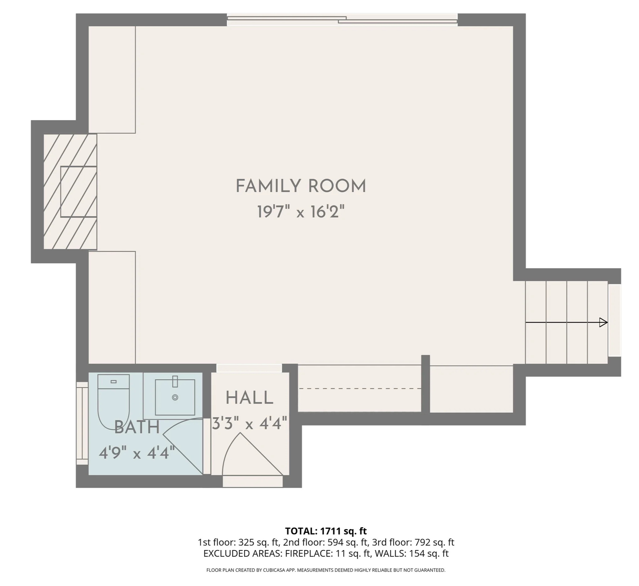 Floor plan of a house showing a family room measuring 19'7" x 16'2", a bathroom, and a hall, with stairs leading to the second floor. Total area is 1711 sq ft.
